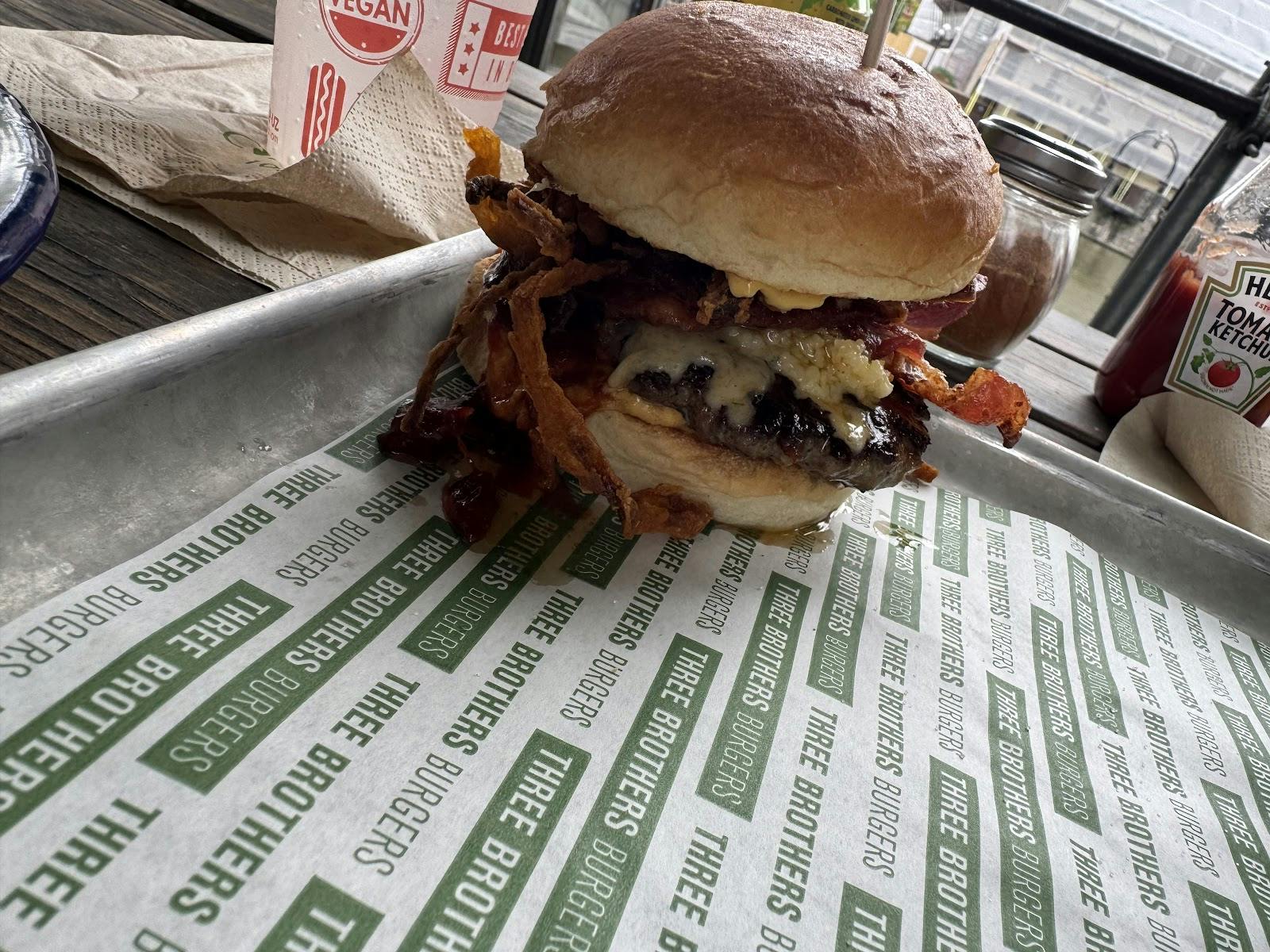 THREE BROTHERS BURGERS - >Char Baggott</a>