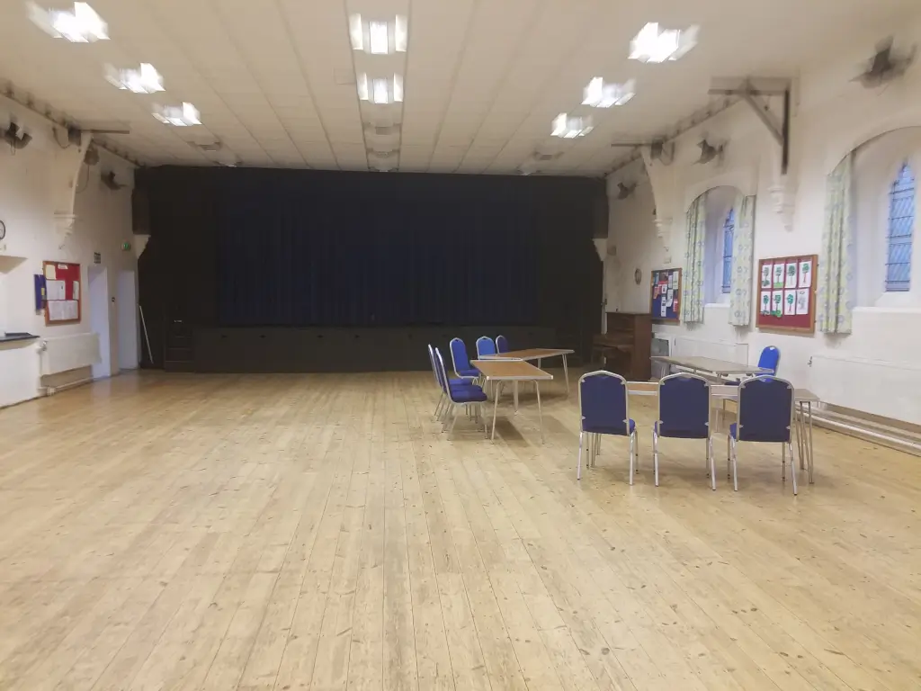 St Albans Pentecostal Church boardroom: hardwood floor community hall for small event meetings.