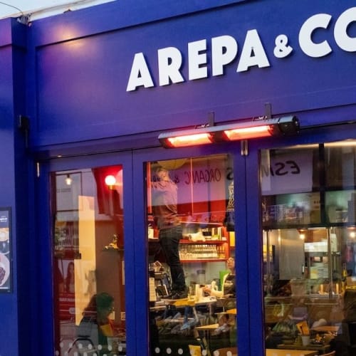 Arepa & Co Brixton event venue, staff preparing space for corporate catering or private party.