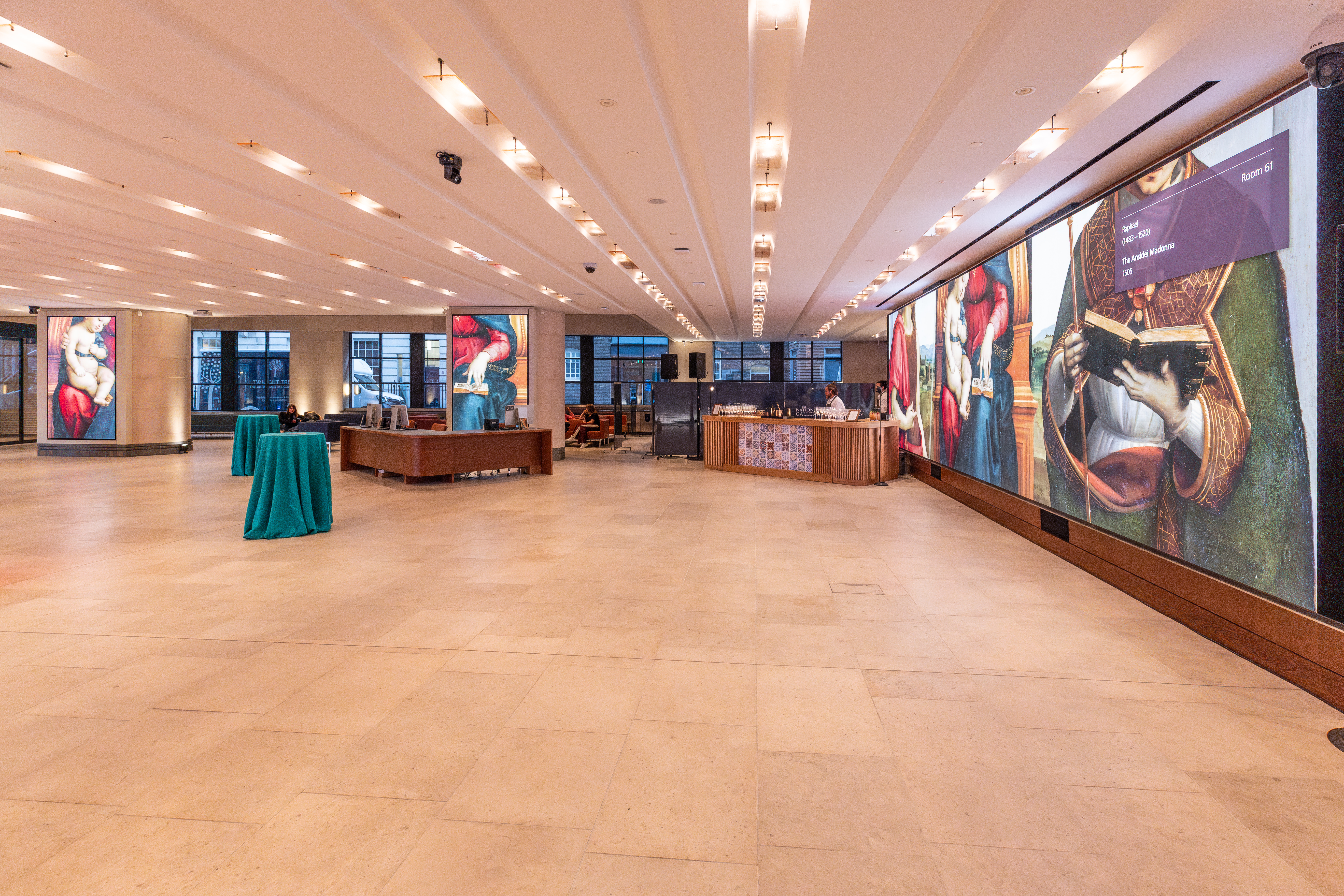 Sainsbury Wing Foyer event space with modern lighting for corporate gatherings and presentations.