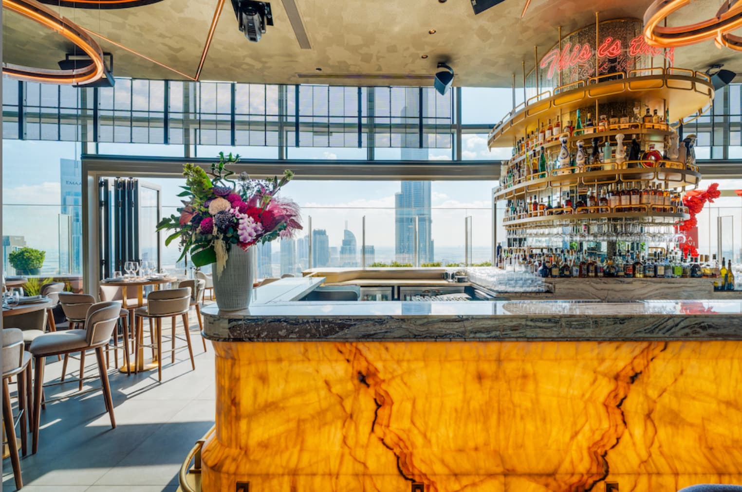 Sophisticated CÉ LA VI London venue hire with marble bar, perfect for events and receptions.