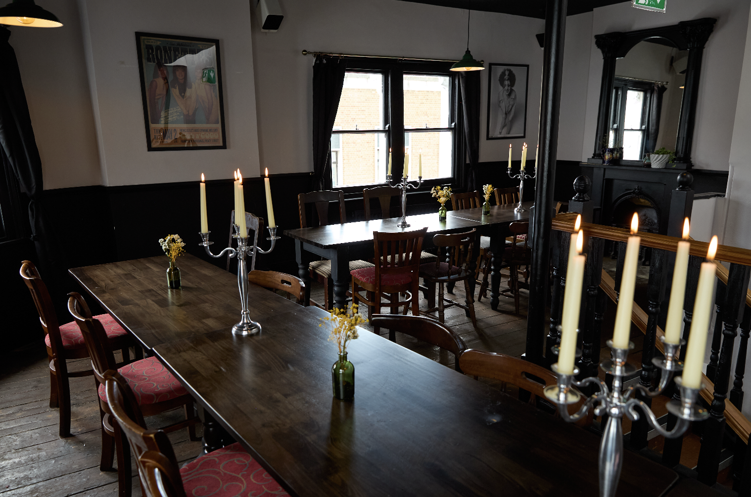 Elegant 2nd Floor Dining Room with wooden table for networking events or private dinners.