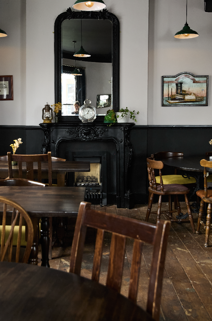 Cozy 1st Floor Dining Room at The Islington Townhouse, perfect for intimate gatherings or meetings.