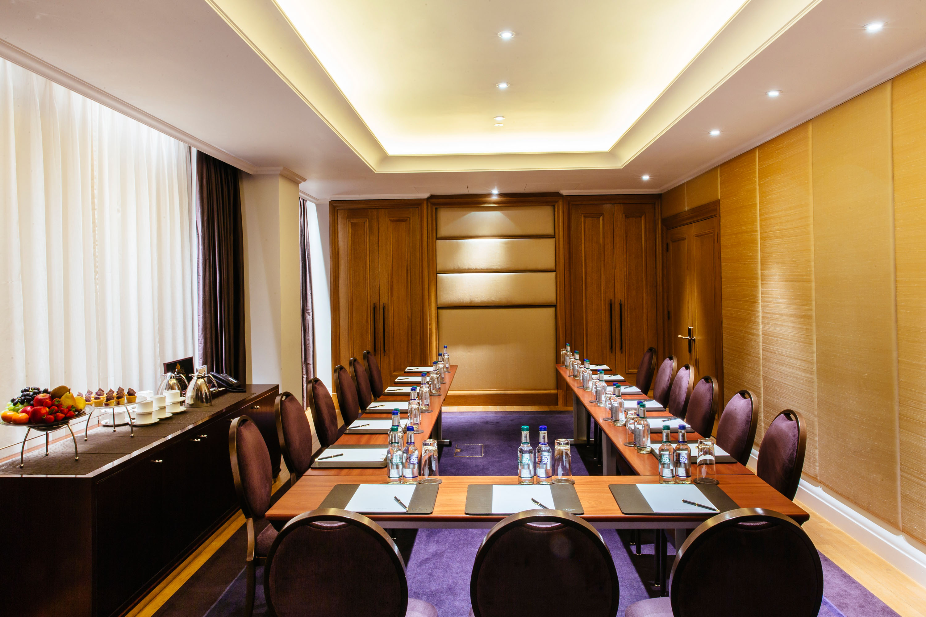 Orion Room at Corinthia London: spacious meeting space with natural light, ideal for corporate events.