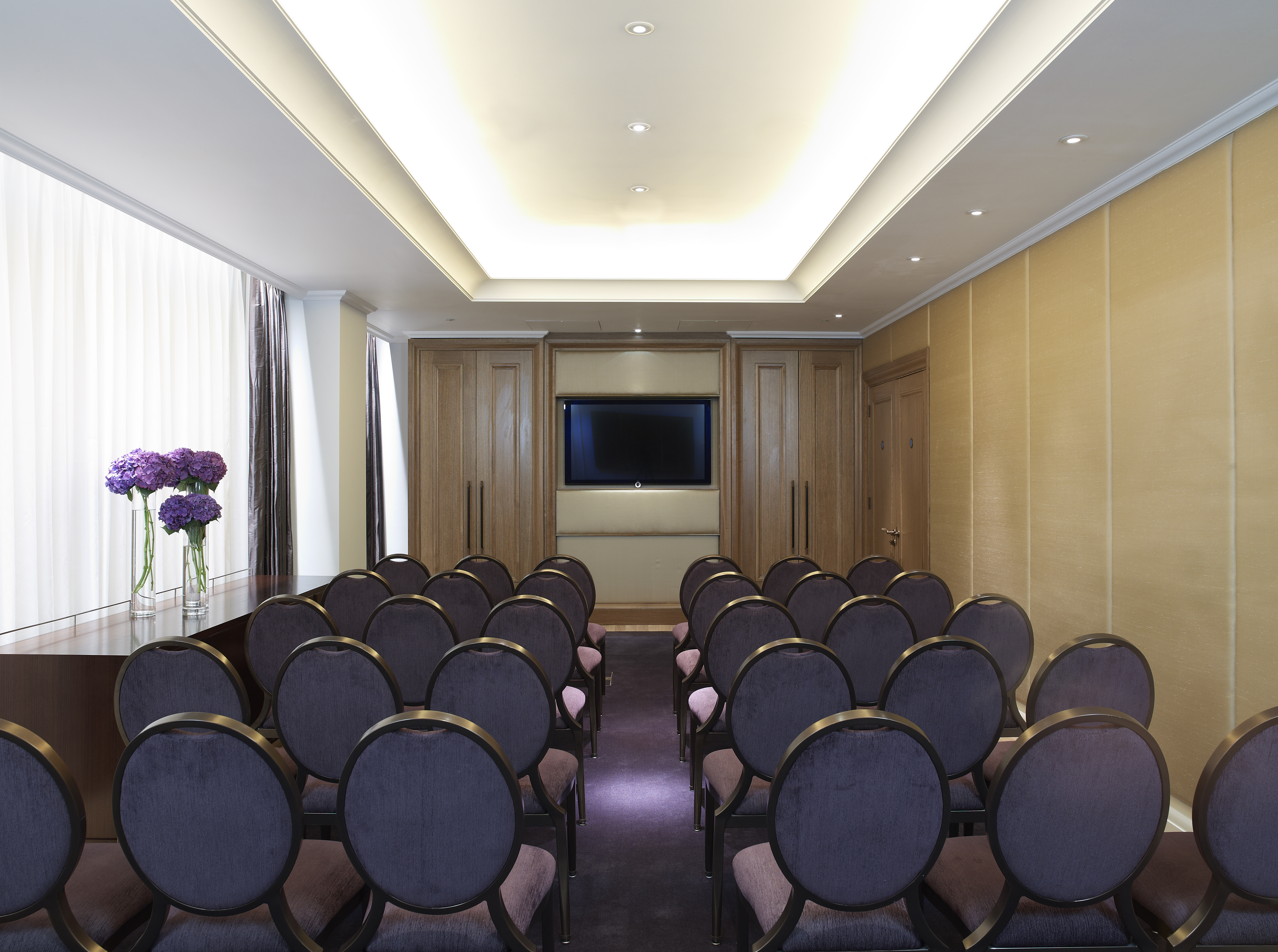 The Orion Room at Corinthia London, featuring elegant seating for corporate events.