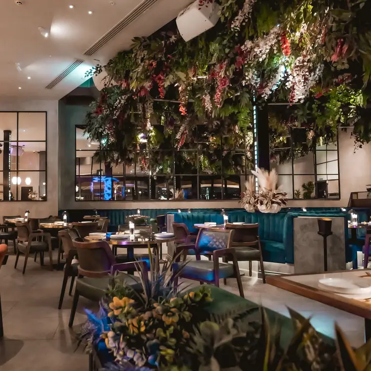 Luxury restaurant with floral decor for corporate dinners and VIP receptions.