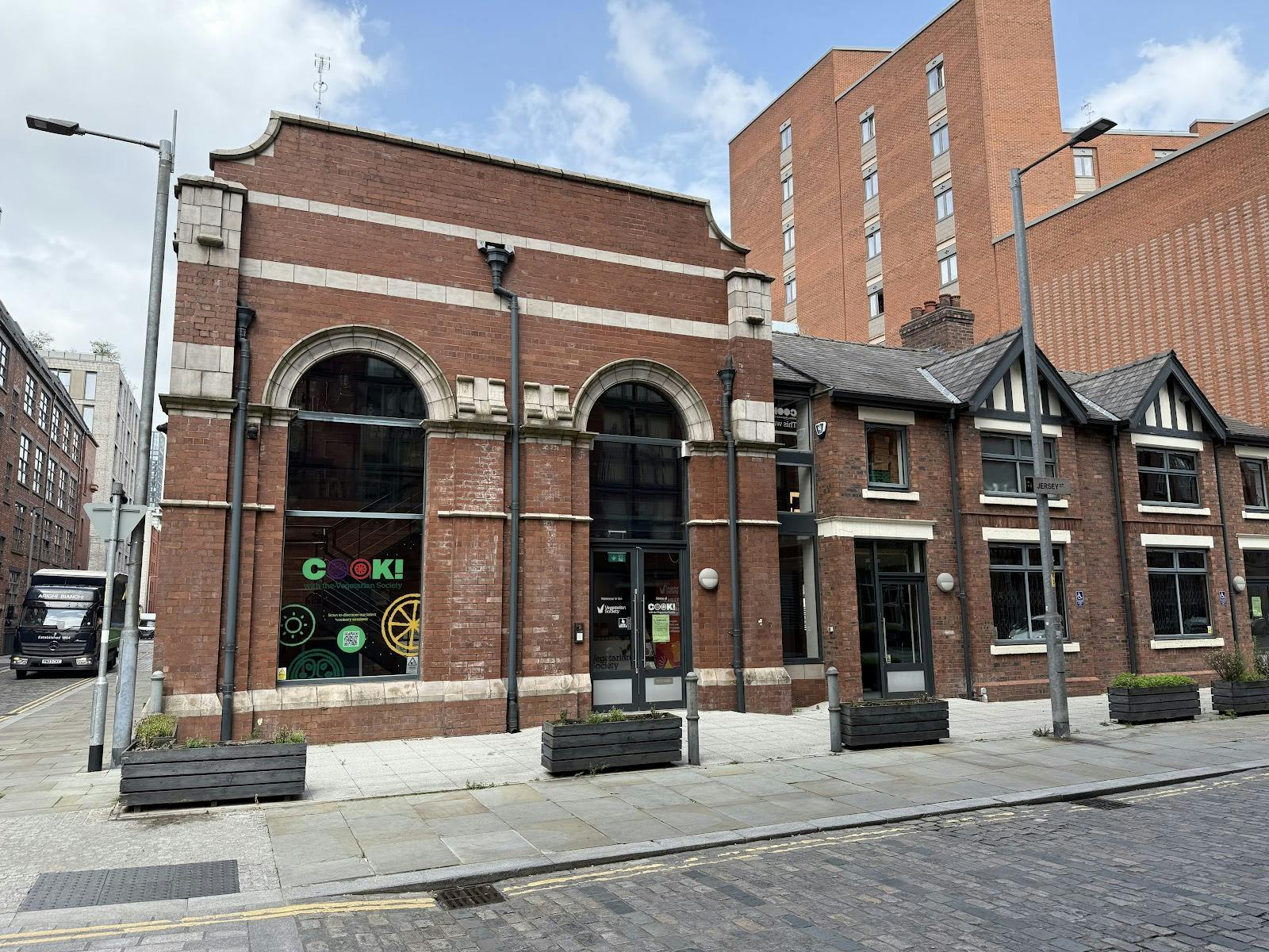 Industrial-chic Development Kitchen venue with exposed brick for corporate events and product launches.