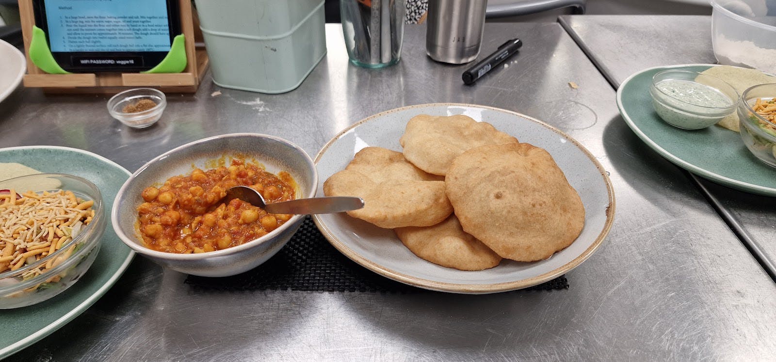 Communal chickpea curry lunch at Development Kitchen event venue for catering and corporate hire.