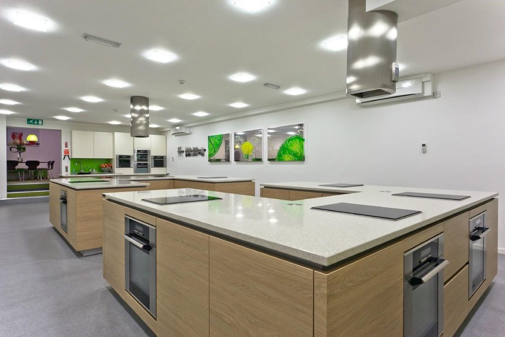 Modular development kitchen for corporate culinary workshops and team-building events.