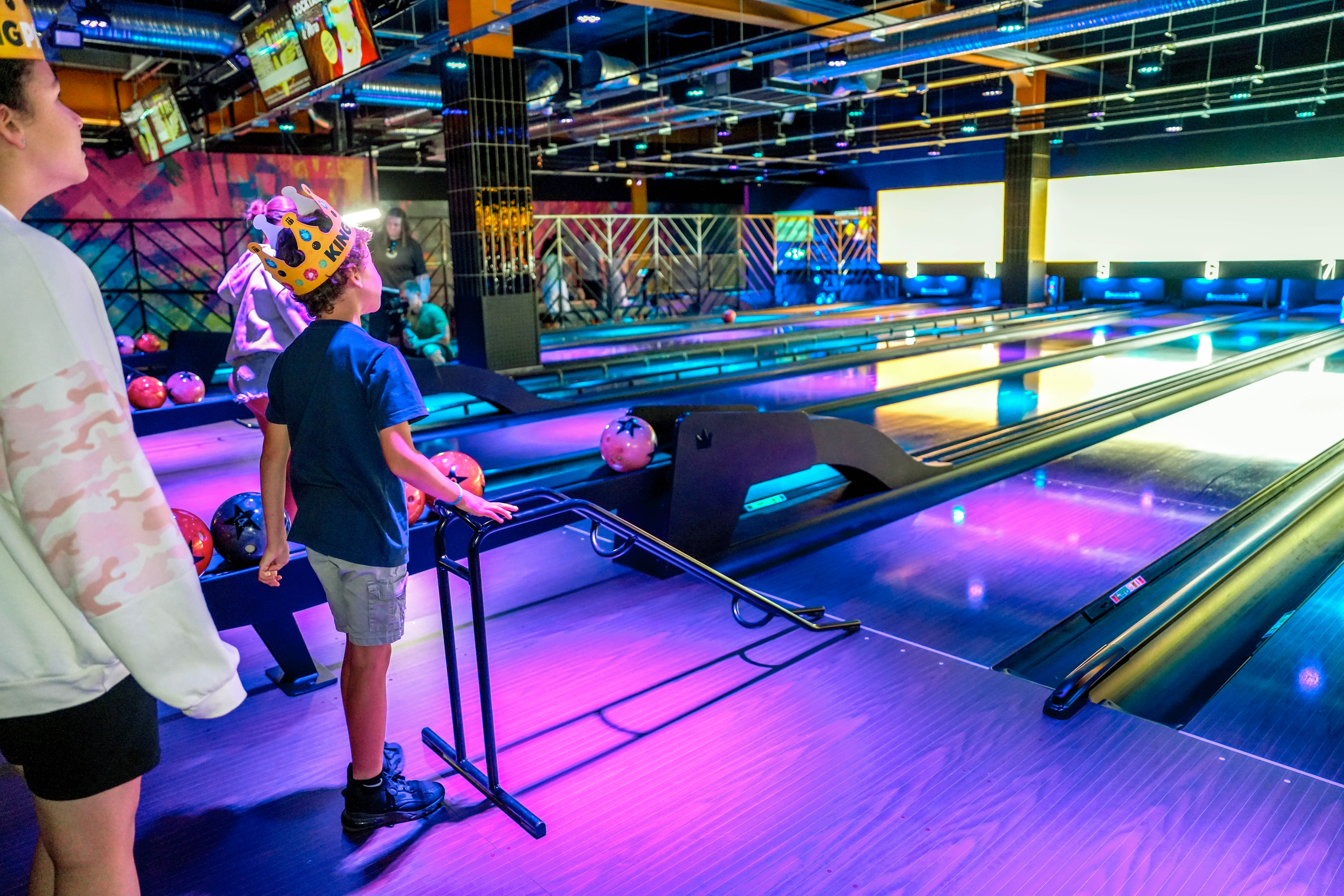 Vibrant bowling alley at King Pins Leeds for team-building and family events.