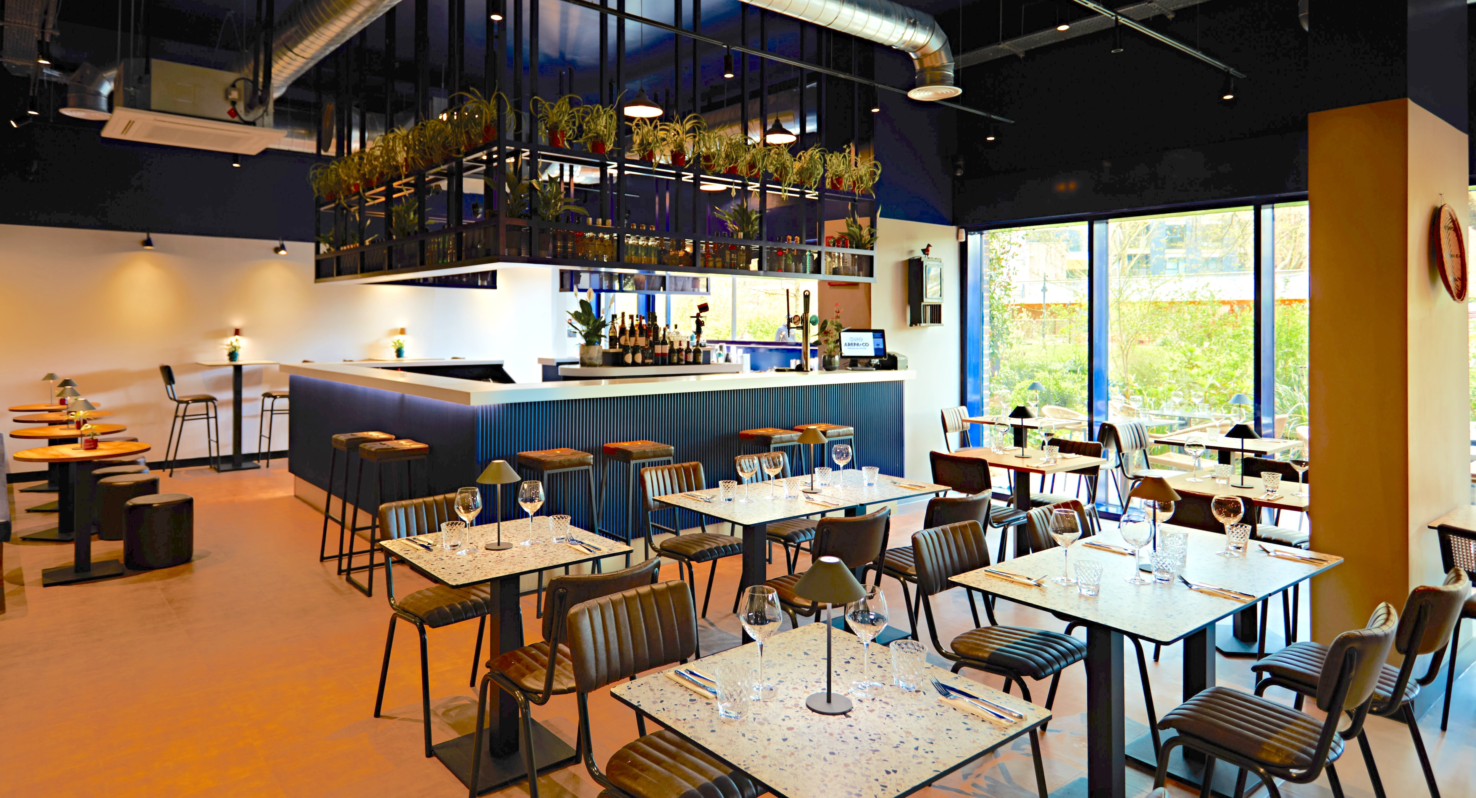 Contemporary restaurant hire in Elephant Park for events, featuring modern decor and spacious layout.