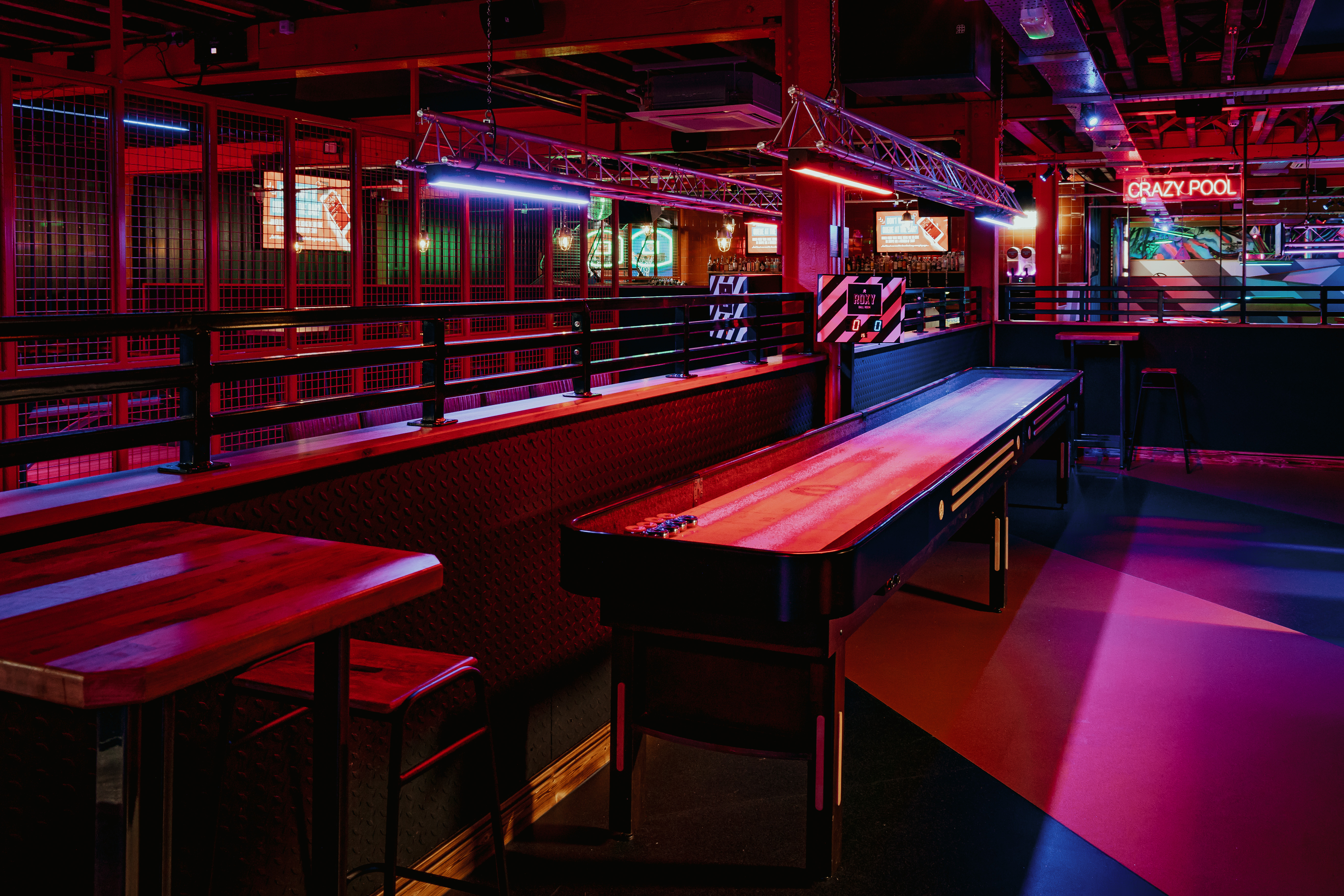 Vibrant shuffleboard area at Roxy Ball Room, perfect for networking and corporate events.