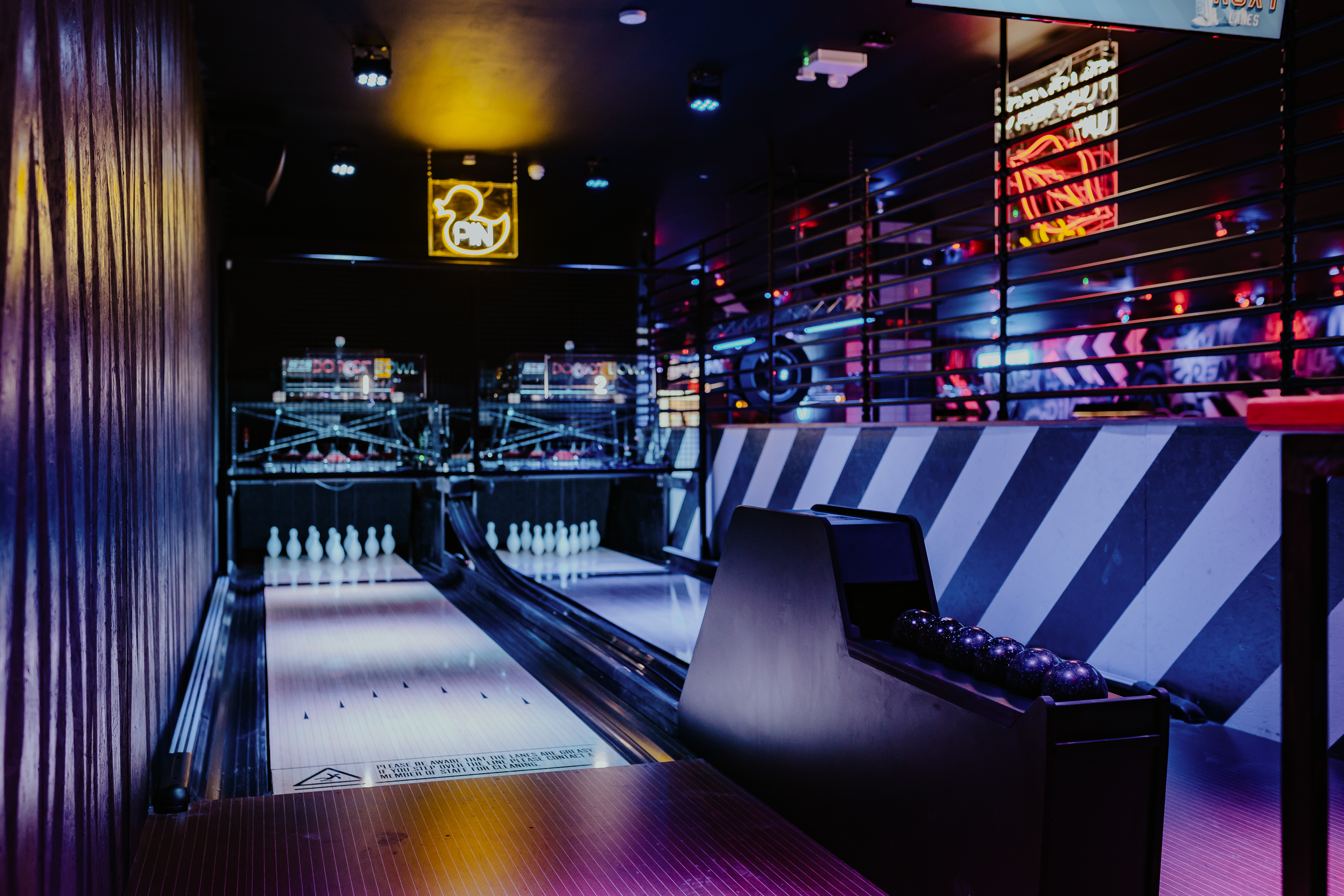 Vibrant bowling alley at Roxy Lanes, ideal for corporate events and team-building activities.