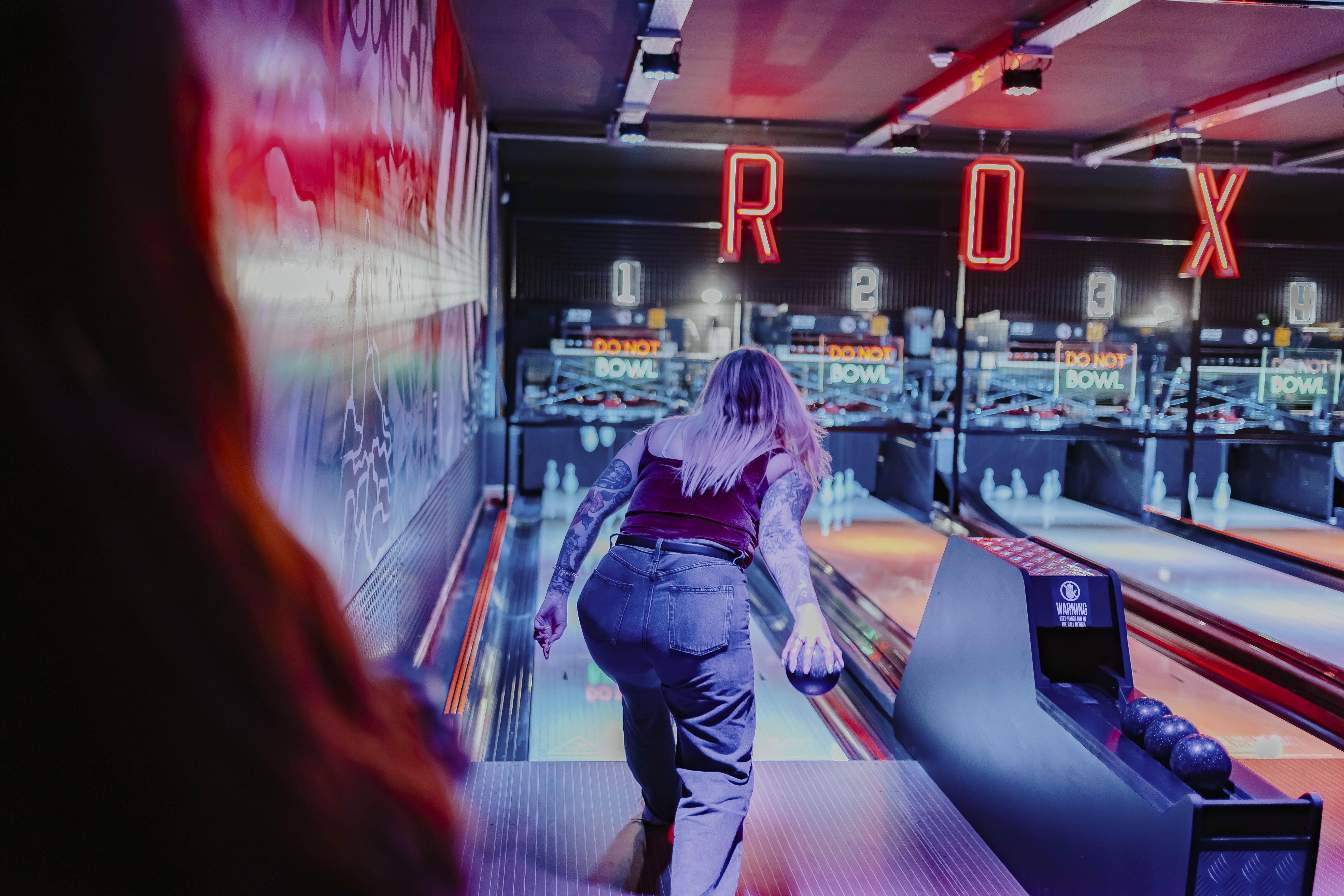 "Vibrant bowling alley at Roxy Ball Room, ideal for corporate events and team building."