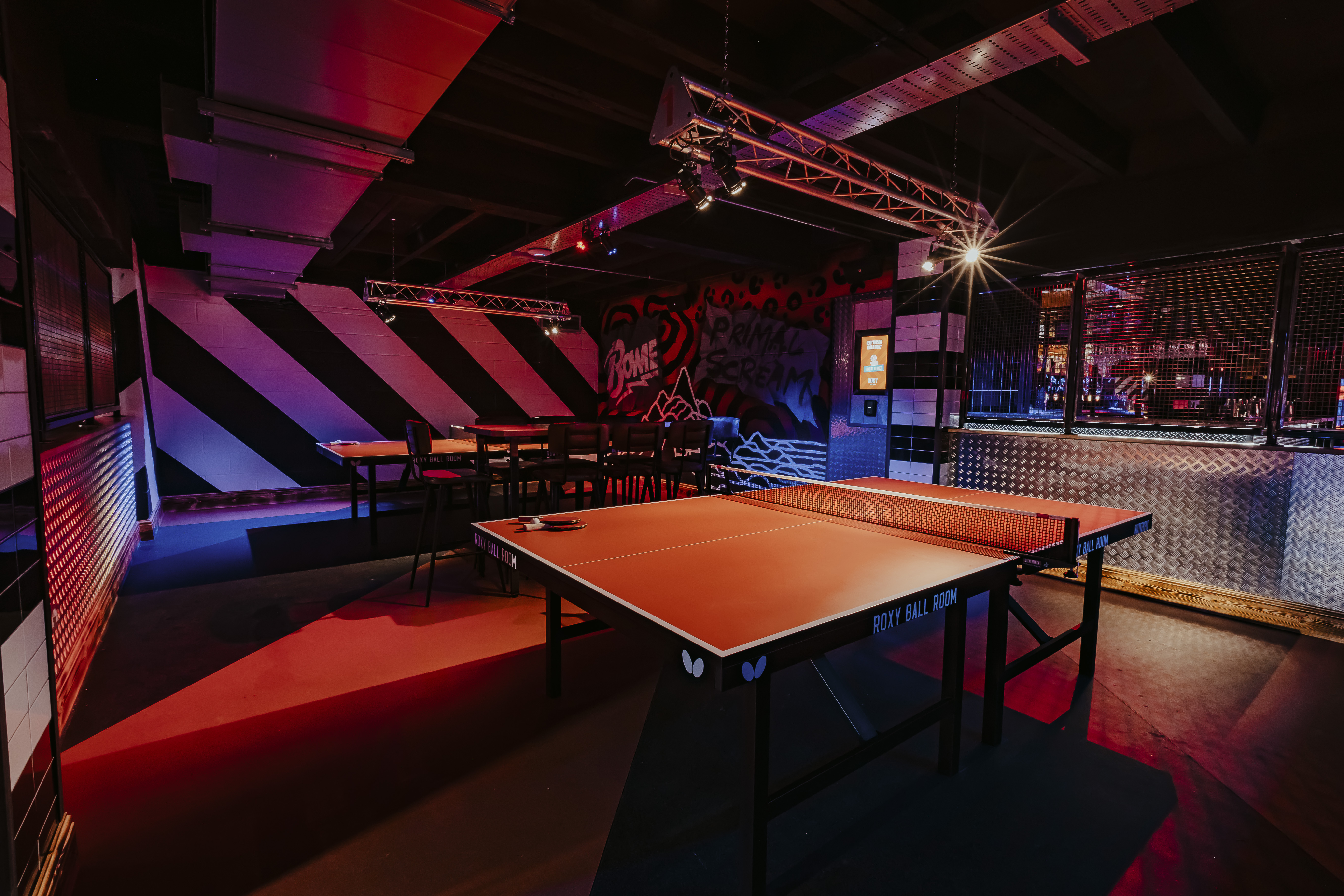 Vibrant event space with ping pong table at Roxy Ball Room, York for team-building activities.