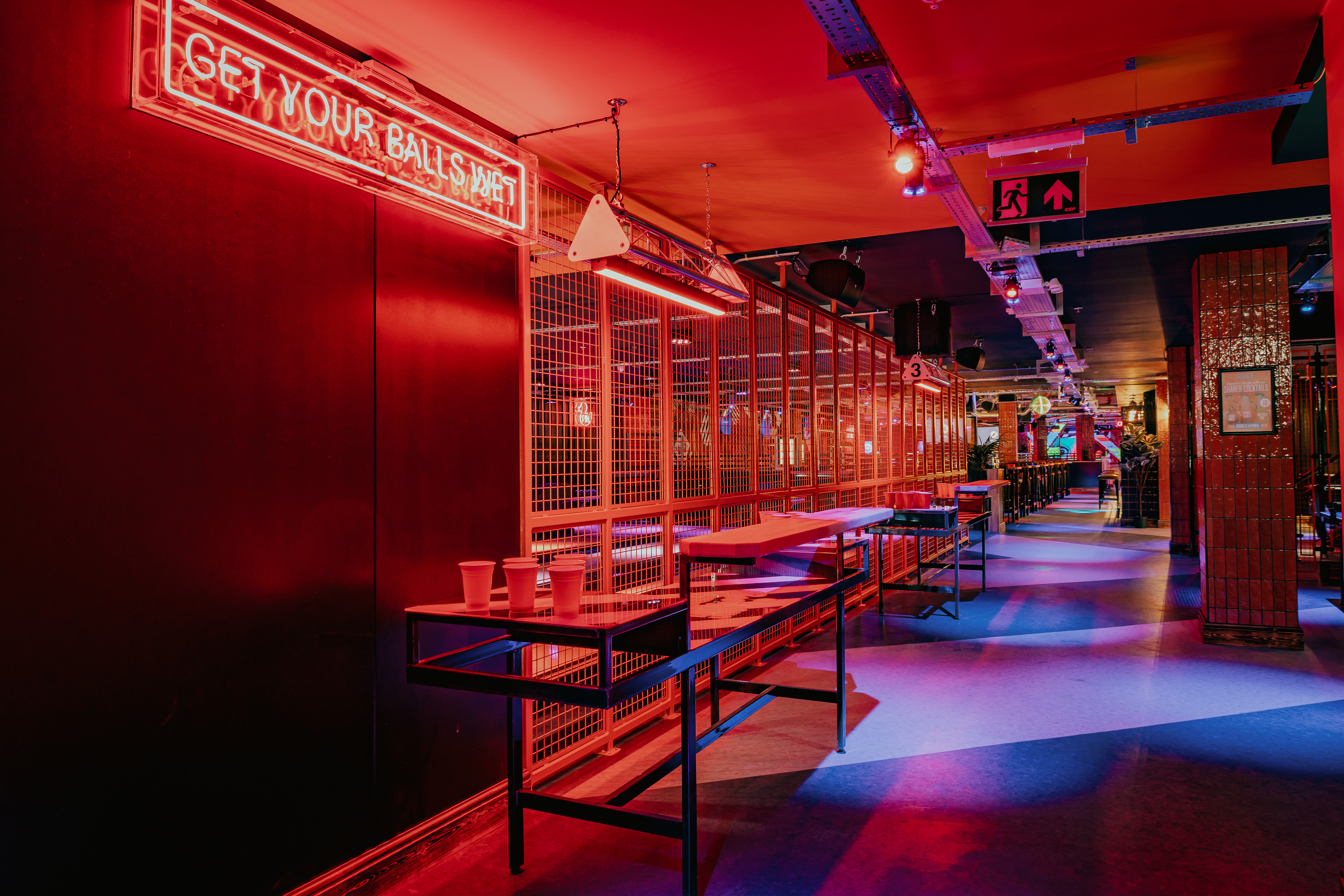 Vibrant Roxy Ball Room venue with neon lights, ideal for networking and team-building events.