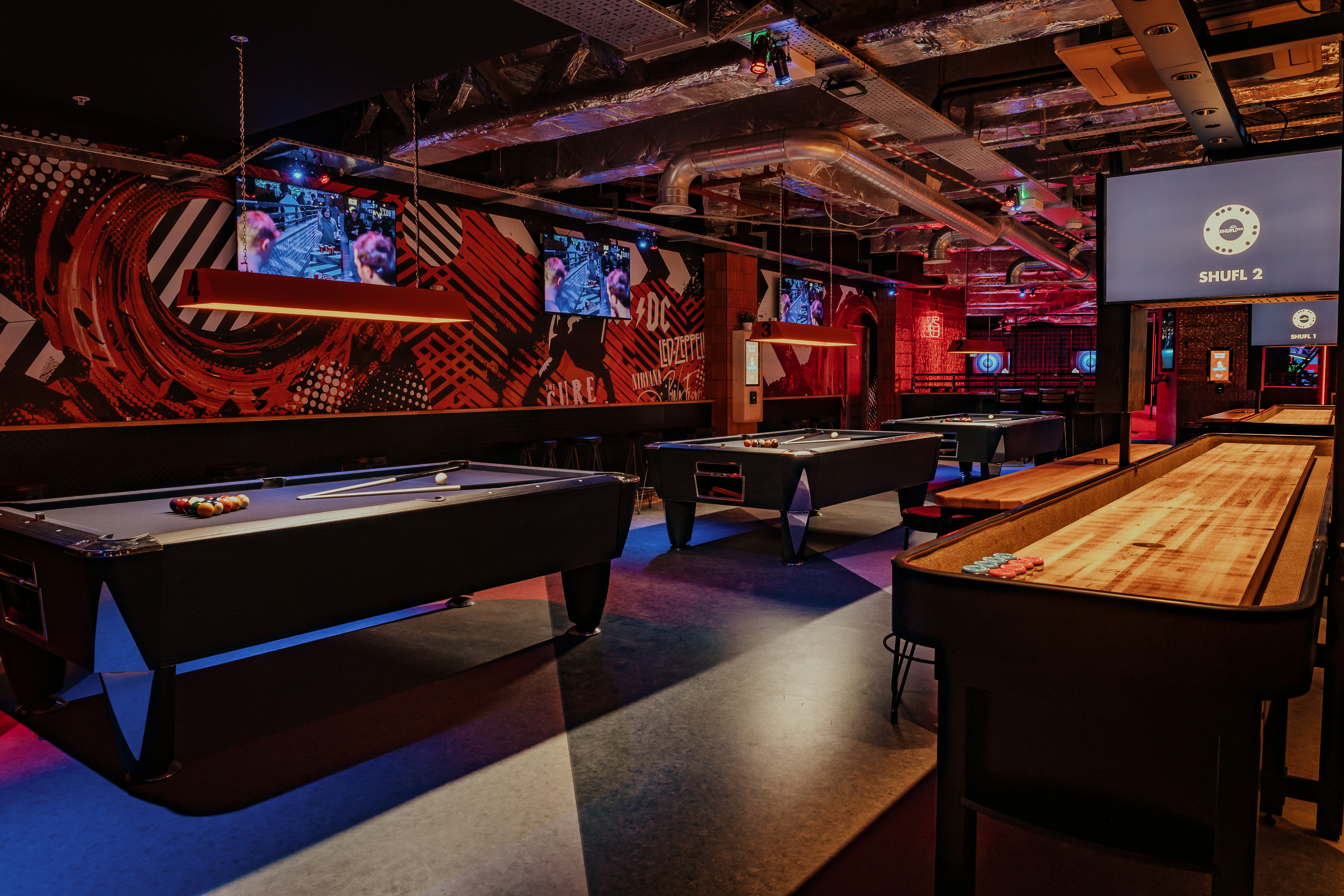 The Gaming Hall at Roxy Ball Room, London: vibrant event space with pool tables. 