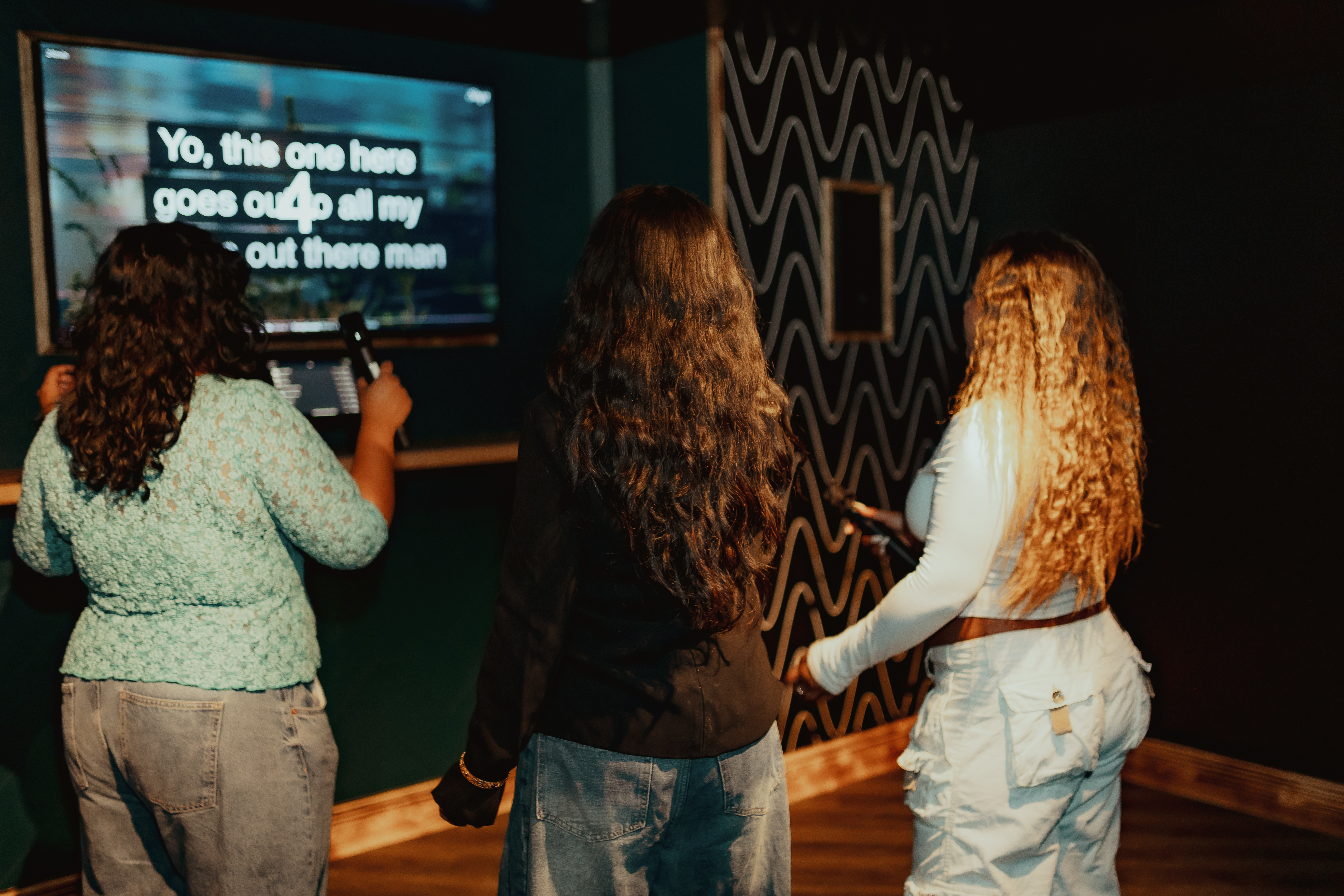 Karaoke and beer pong event at Roxy Ball Room, St Mary Axe, London for team-building fun.