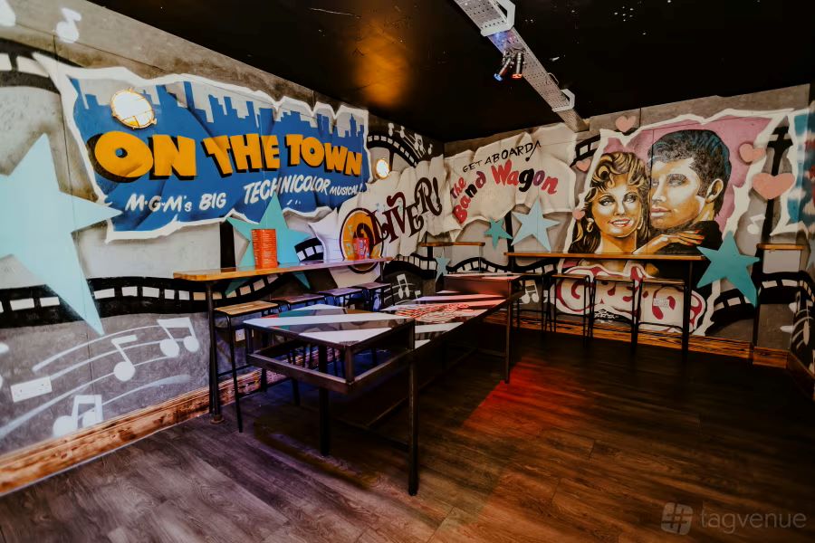 Karaoke and Beer Pong at Roxy Ball Room in London with vibrant graffiti decor.