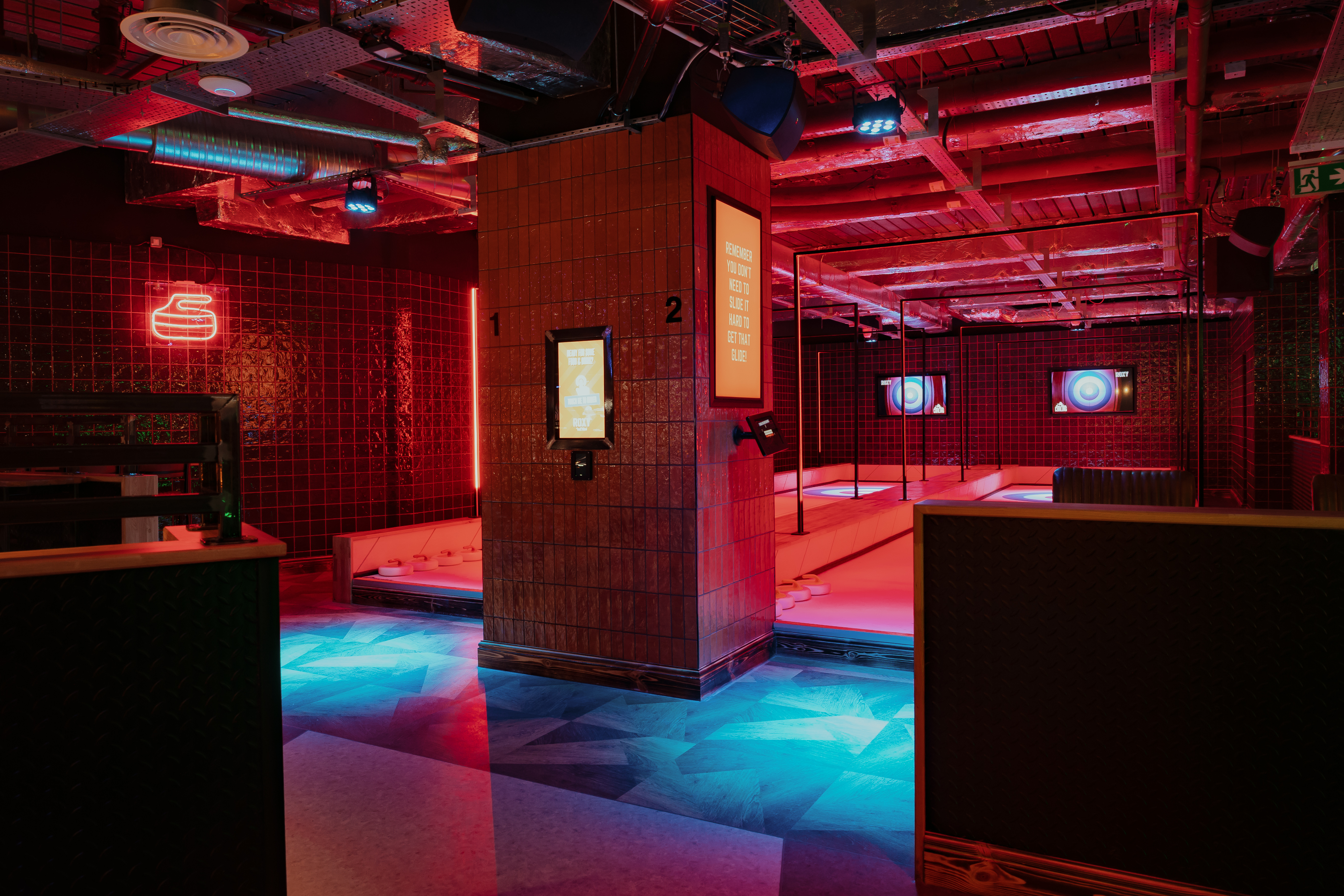 Modern event space with neon lights at The Lodge in London for corporate events and parties.