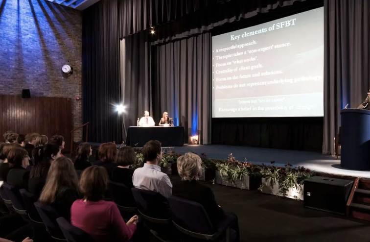 Magdalene College Wolfson Hall stage, seating, presentation screen