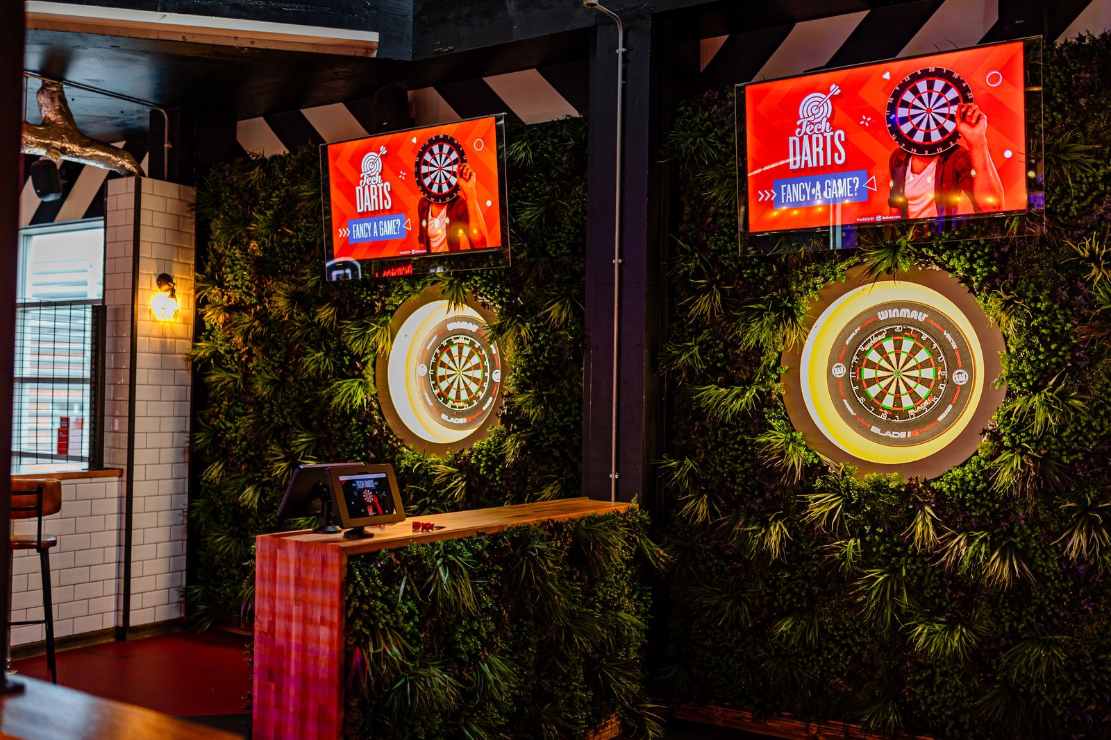 "Vibrant darts setup in Roxy Ball Room, ideal for corporate events and team-building activities."