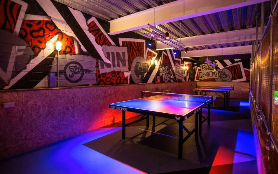 Vibrant Roxy Ball Room balcony with ping pong tables for events in Liverpool.