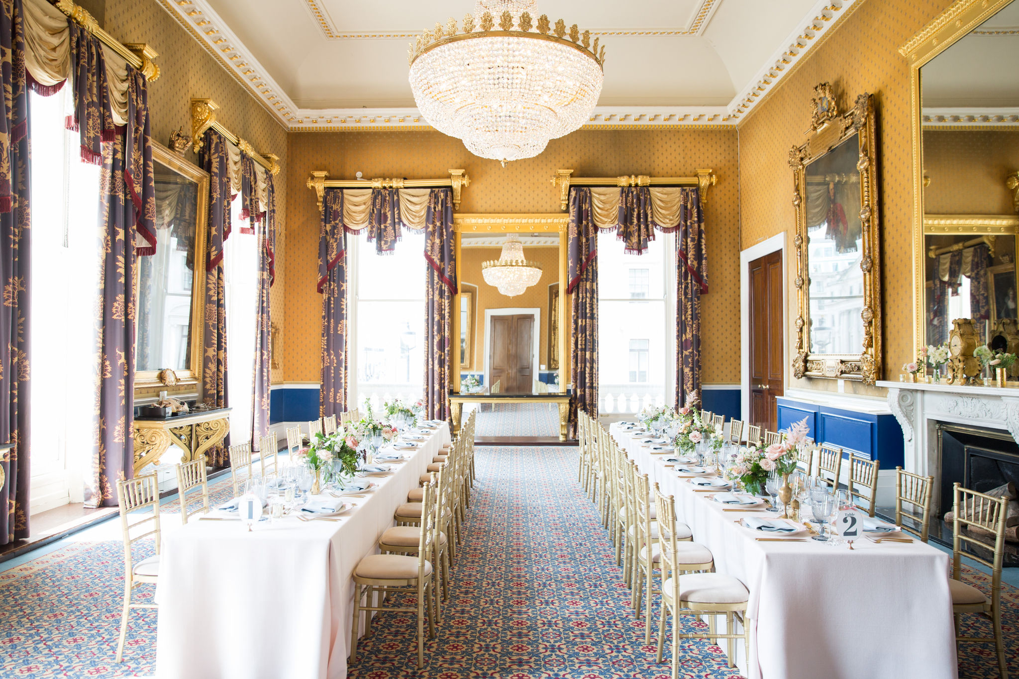 Elegant wedding venue with chandelier and luxurious decor at 116 Pall Mall.