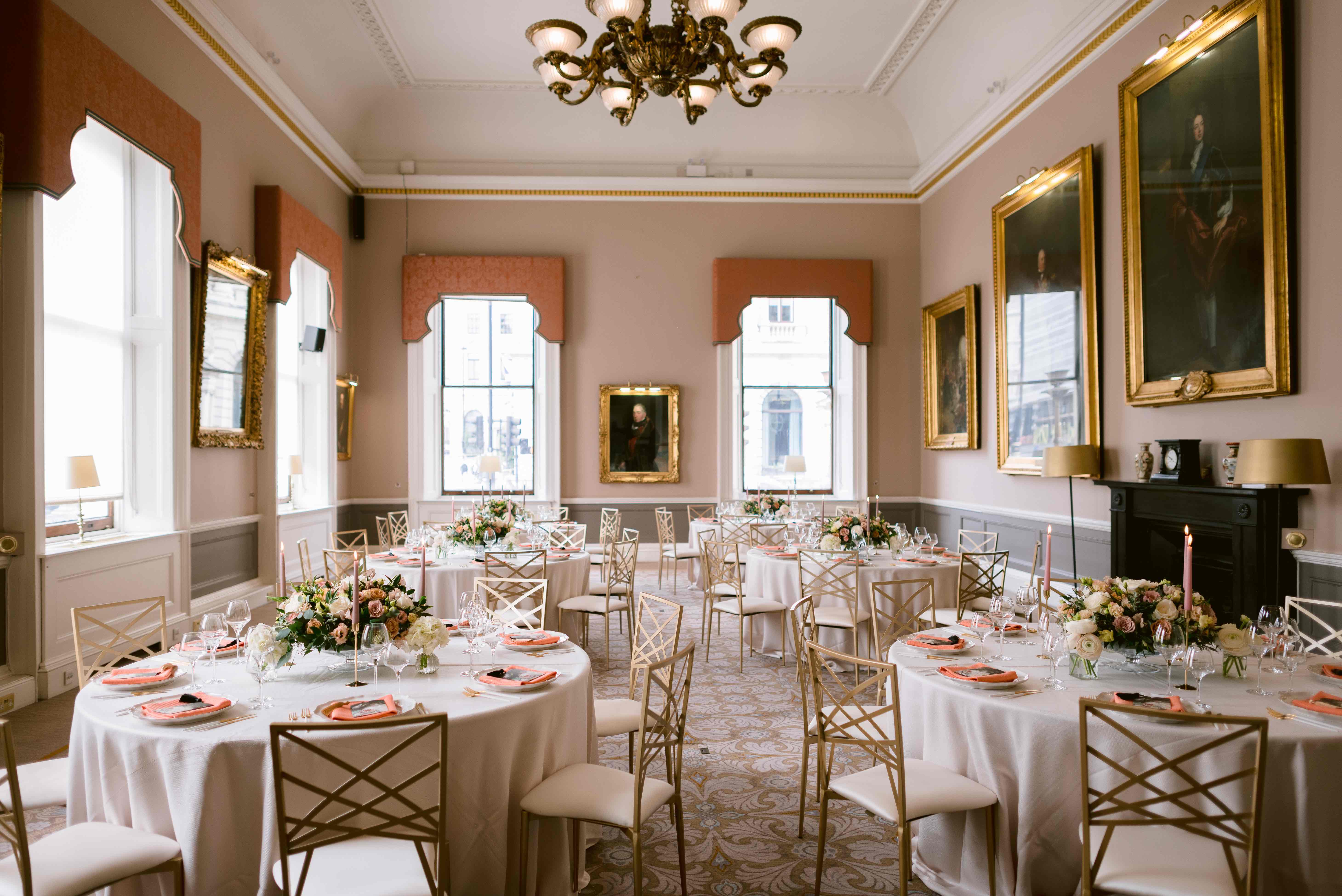 Elegant wedding venue at 116 Pall Mall with floral centerpieces and natural light.