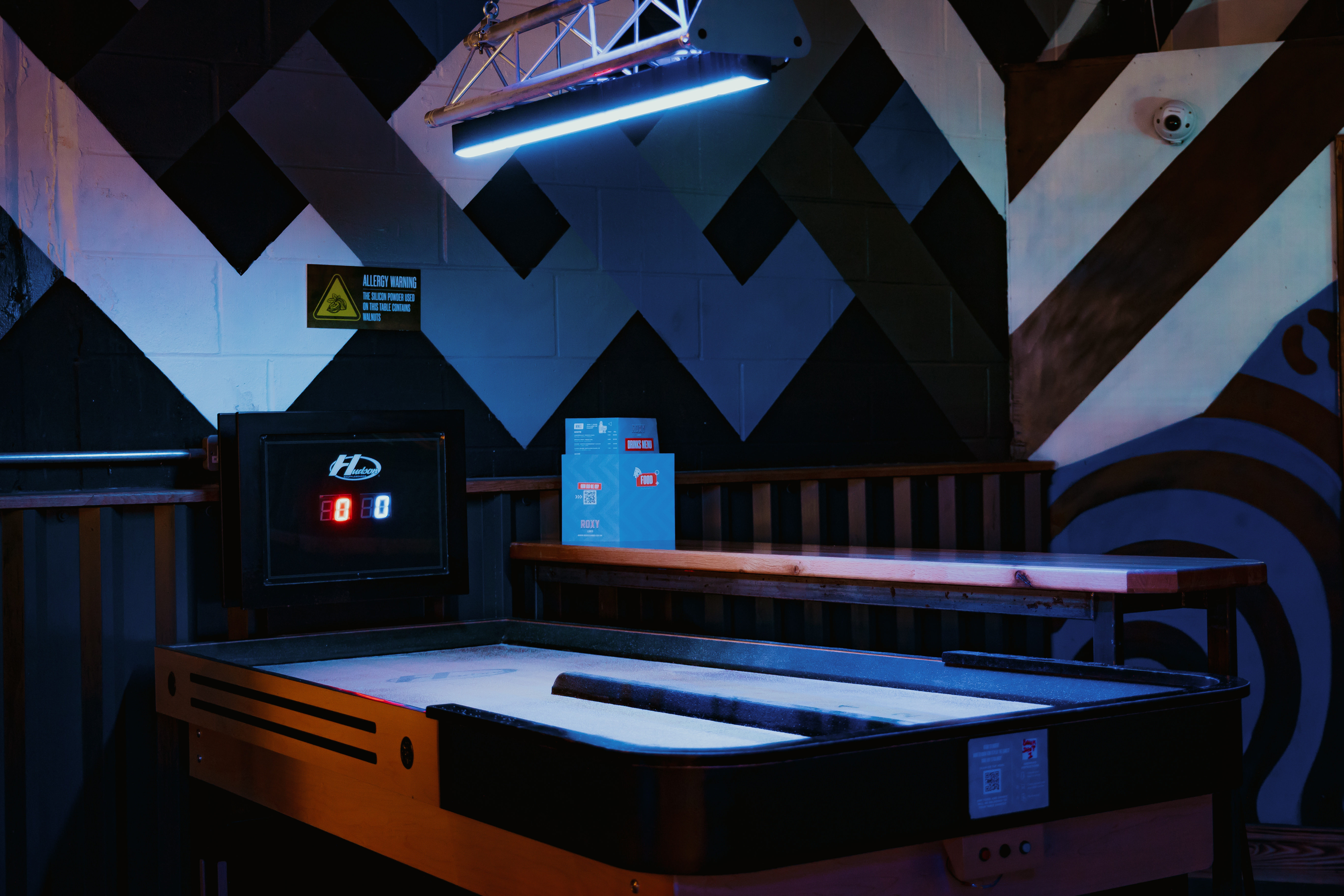 Air hockey table at The Gallery in Roxy Lanes, ideal for networking events and team-building.