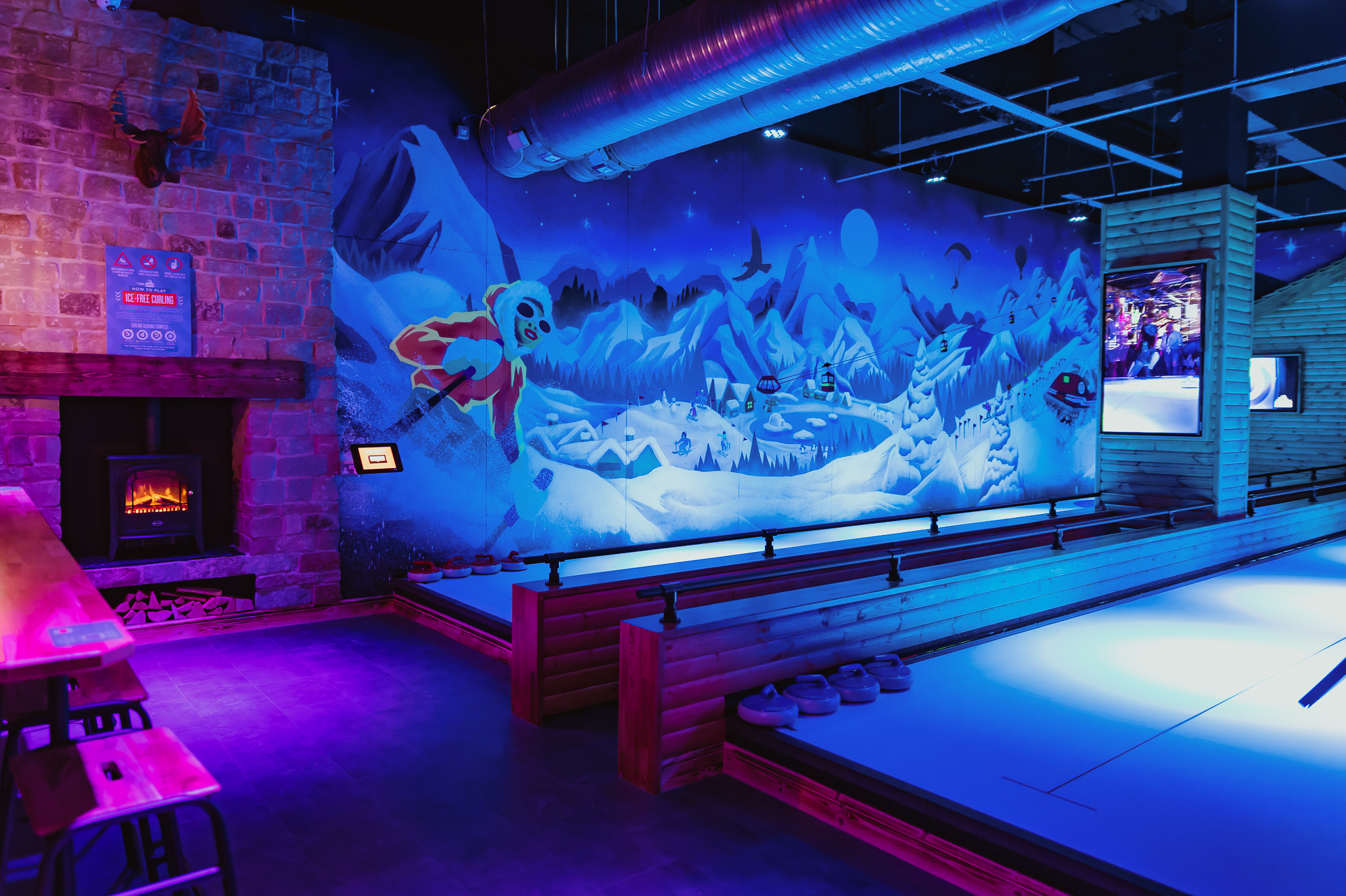 The Lodge at Roxy Lanes Cardiff with ice mural, ideal for events and gatherings.