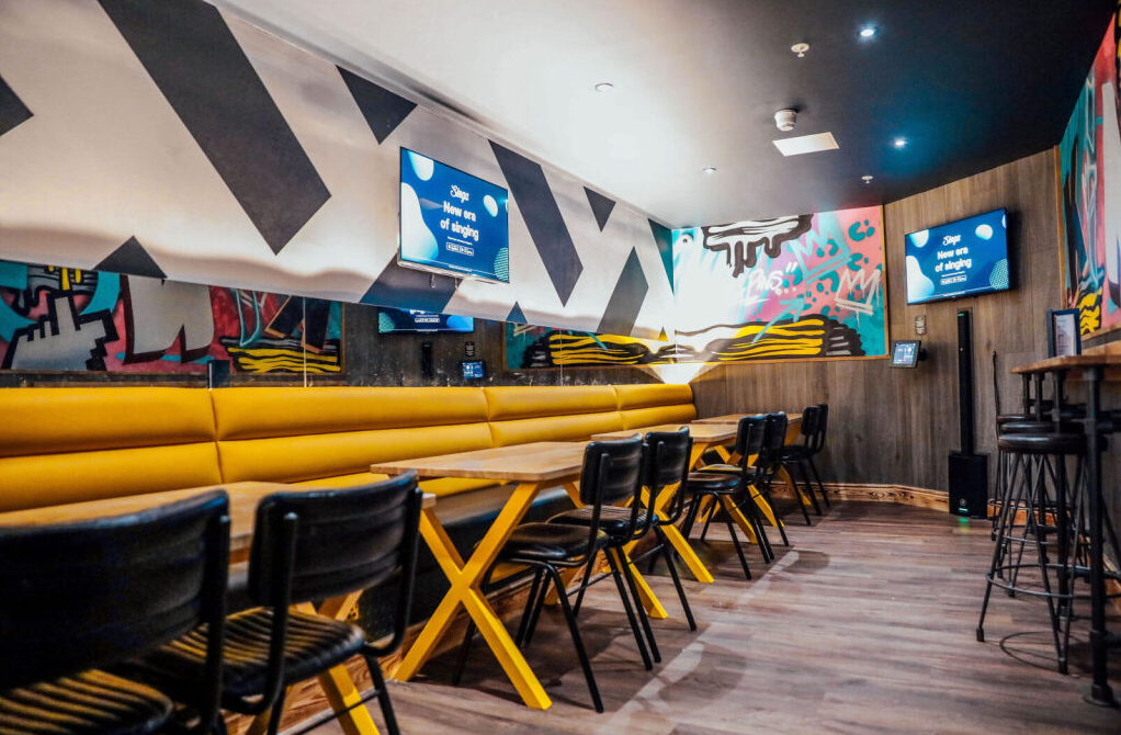 Vibrant meeting space at King Pins, Trafford Palazzo for creative events and gatherings.