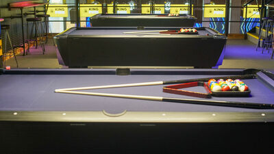 Vibrant pool area at King Pins, perfect for networking and casual team-building events.