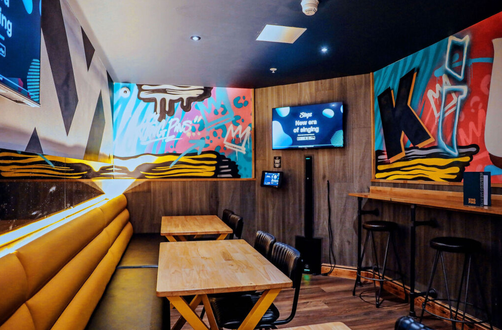 Vibrant meeting space with graffiti art for networking events in Trafford Palazzo, Manchester.