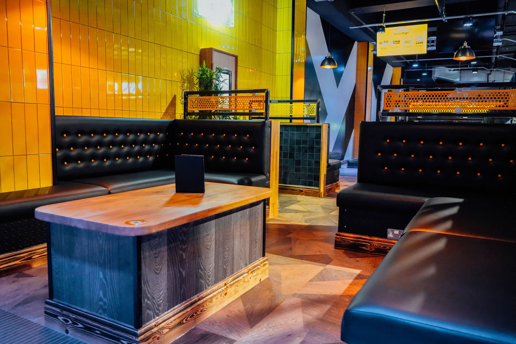 Modern lounge in The Duck Pin Zone, Arndale Manchester; perfect for casual networking events.