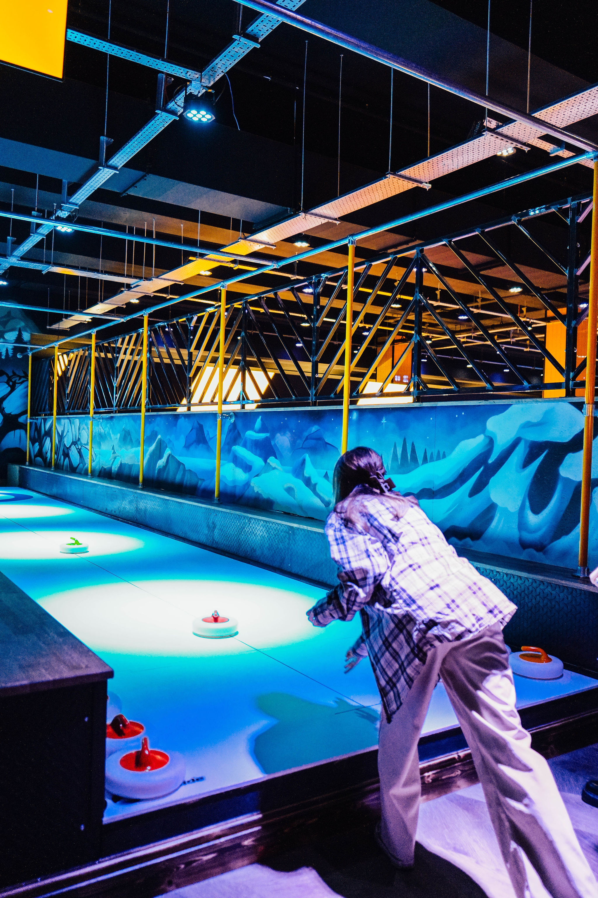 Indoor ice rink at The Glide Zone, vibrant venue for team-building and social events.