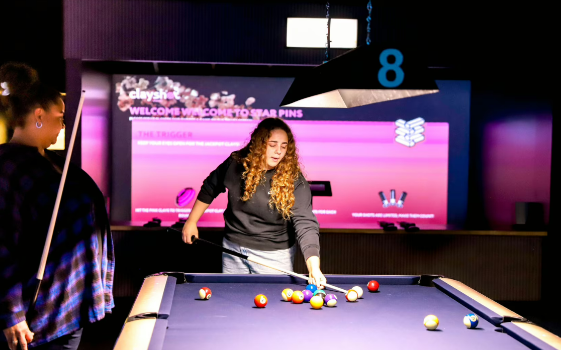 "Shooting Pool Zone at Star Pins: a modern venue for networking events and team-building."