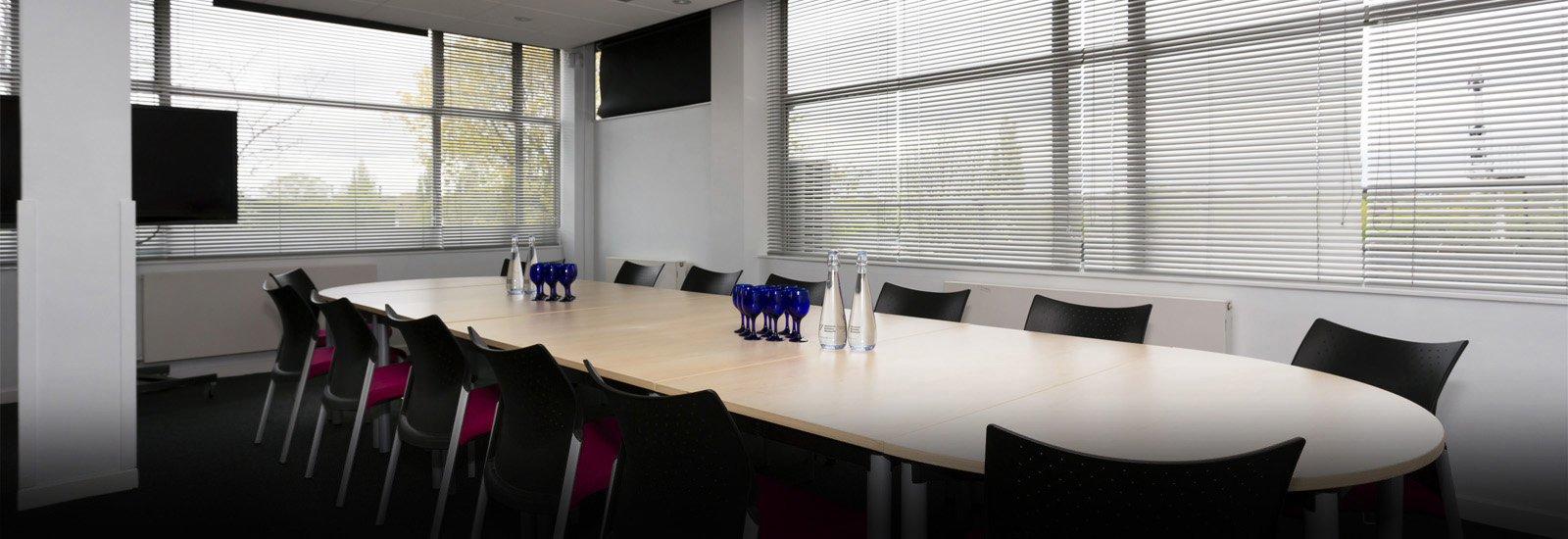 Modern conference room in The Rocket Suite, ideal for corporate events and meetings.