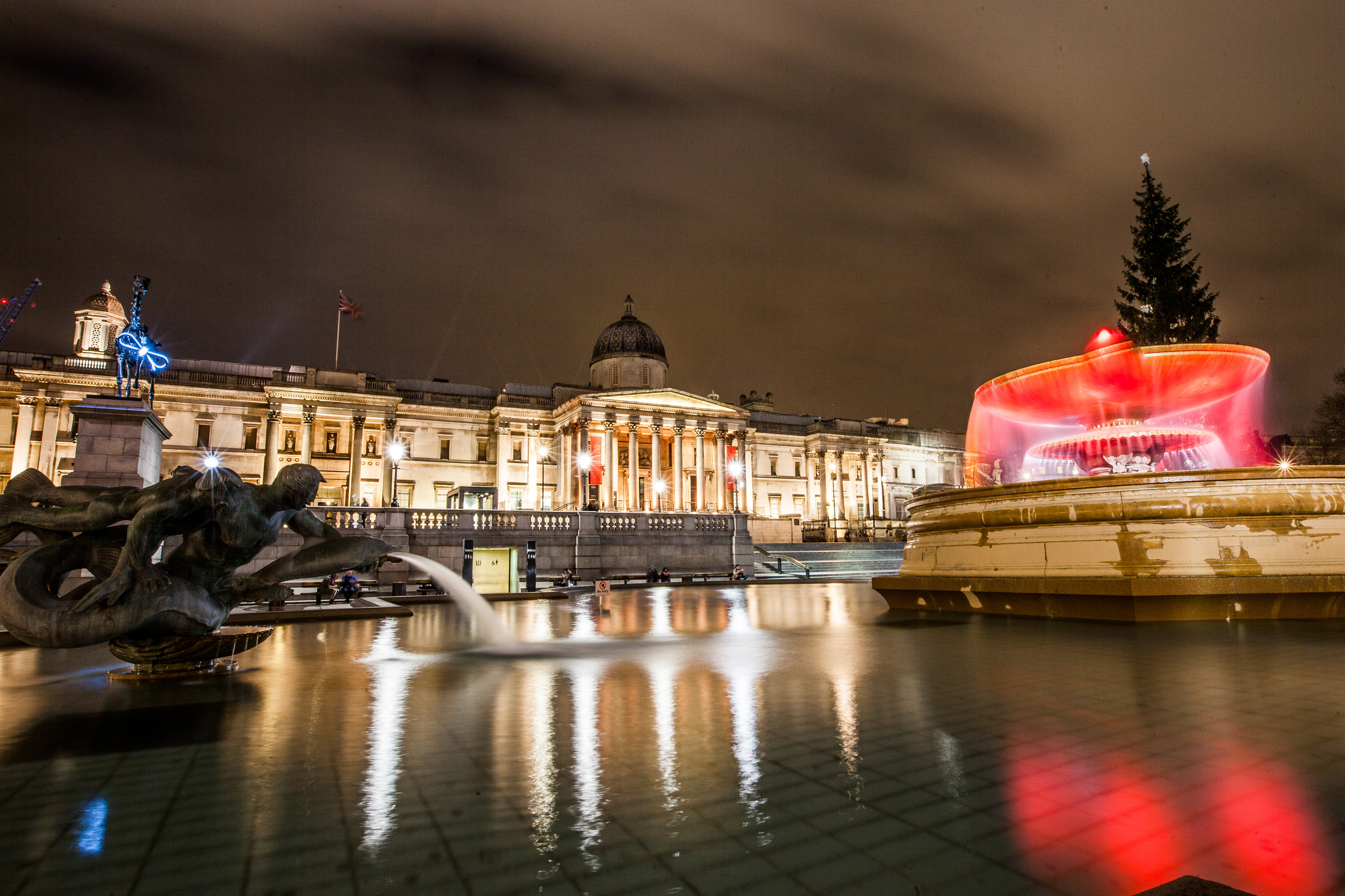 Whole Gallery at The National Gallery with red-lit fountain, ideal for outdoor events.