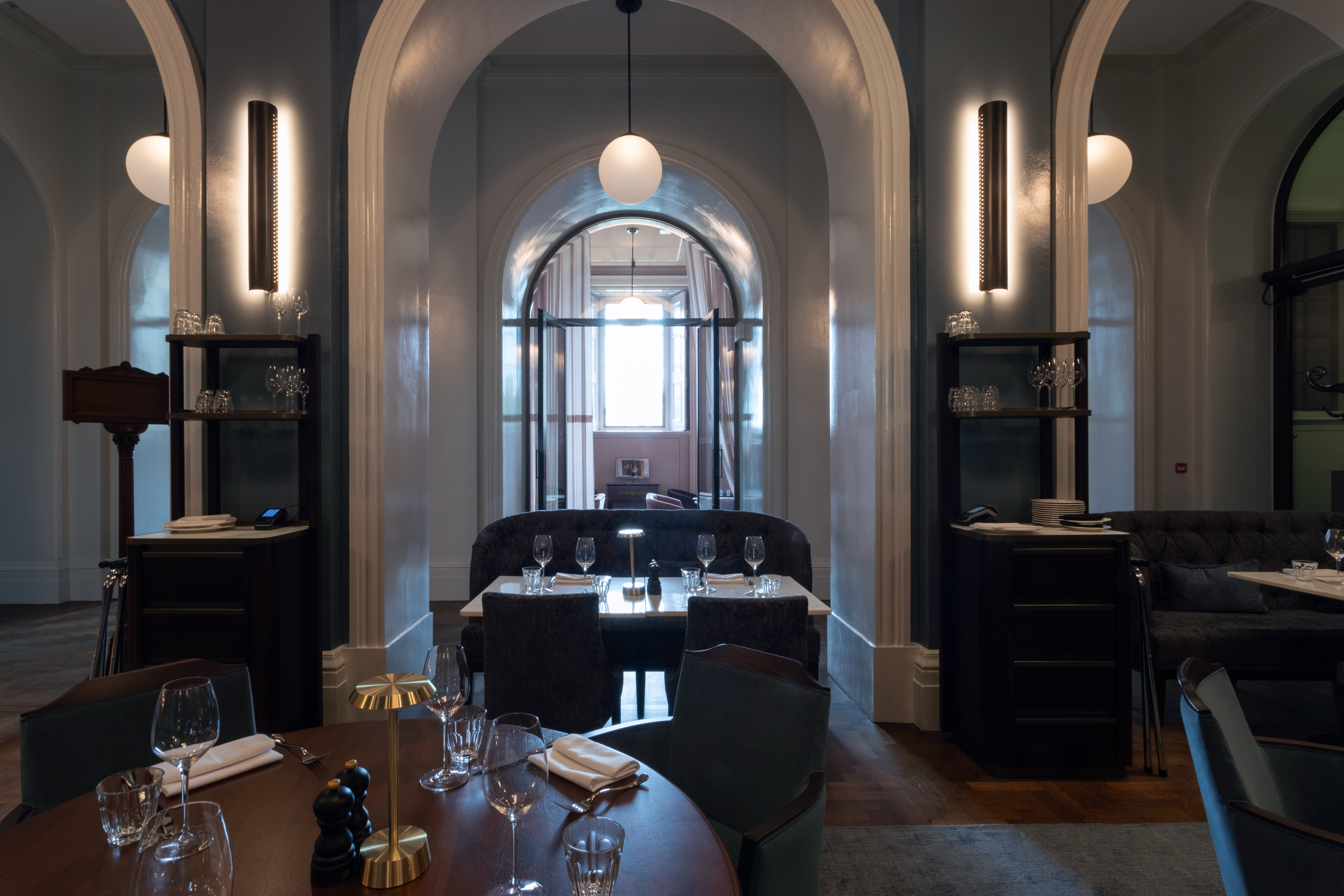 Supporters' House Blue Dining Room with plush furnishings for exclusive corporate events.