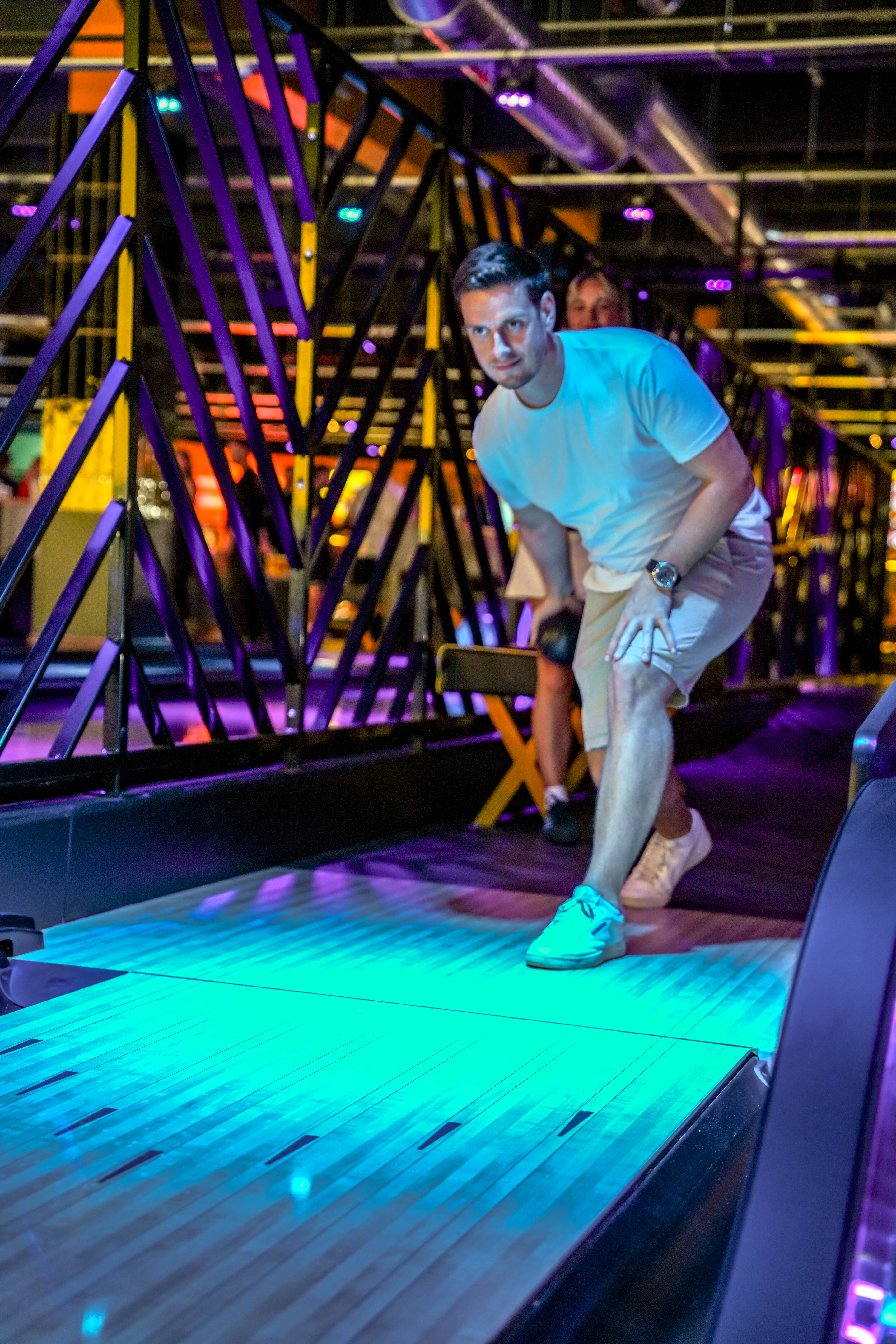 Dynamic event space with vibrant lighting at Duck Pin Zone, King Pins Leeds White Rose.