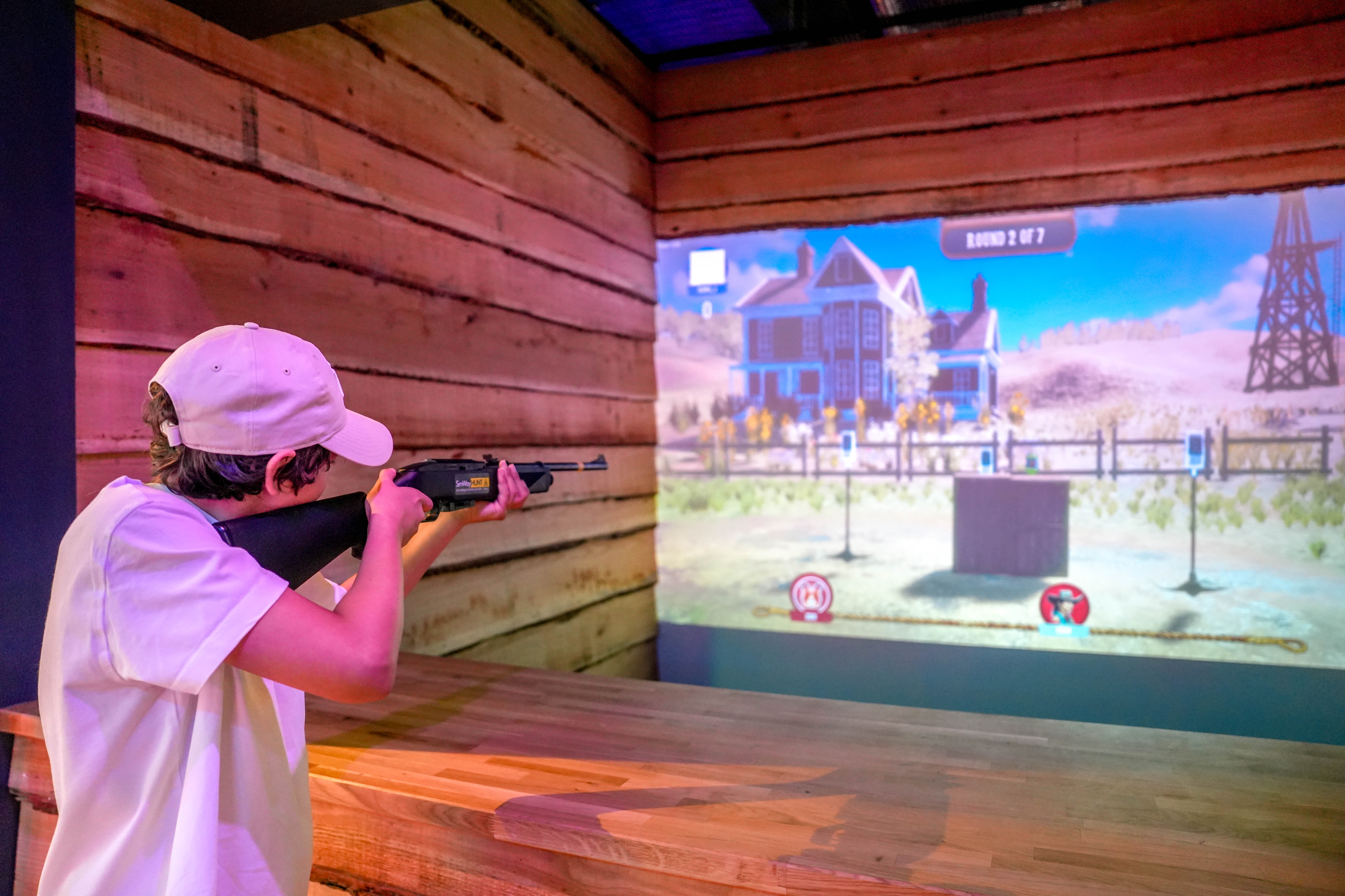 Interactive virtual shooting game at Head To Head Zone, King Pins Leeds for events.