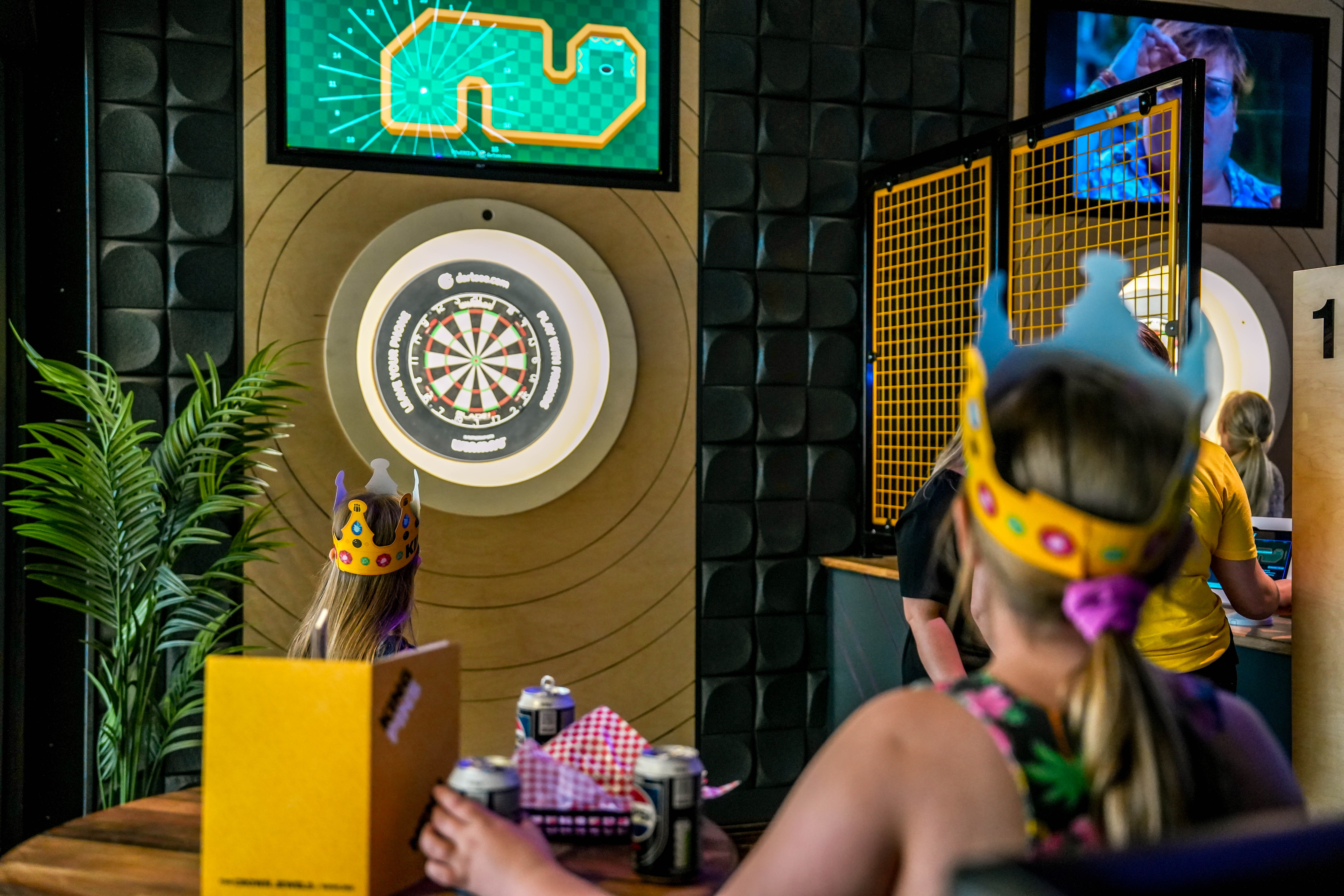 Vibrant dartboard event space at King Pins Leeds for team-building activities.