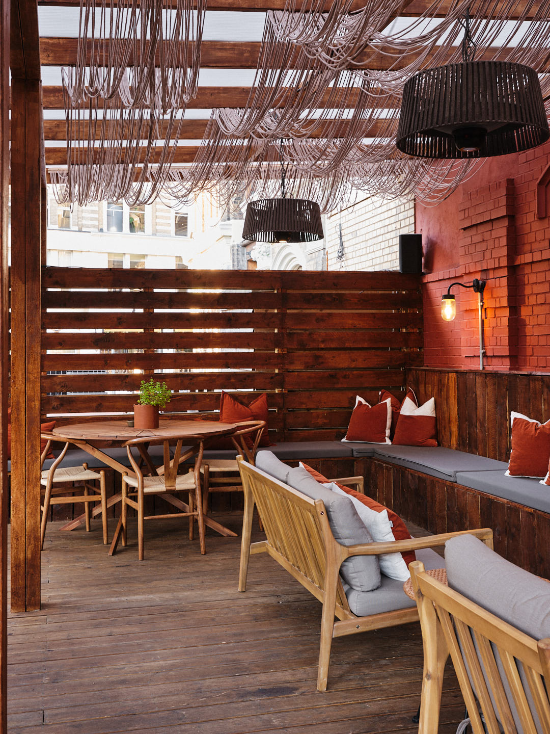Stylish outdoor meeting space at Pyro Hut with cozy seating for casual gatherings.