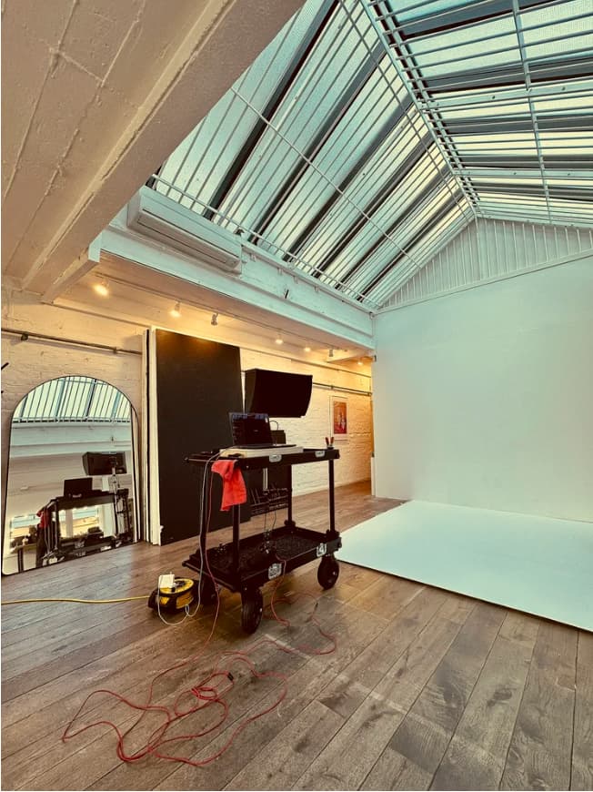 Versatile event space in SW10 Studios with natural light for meetings and workshops.