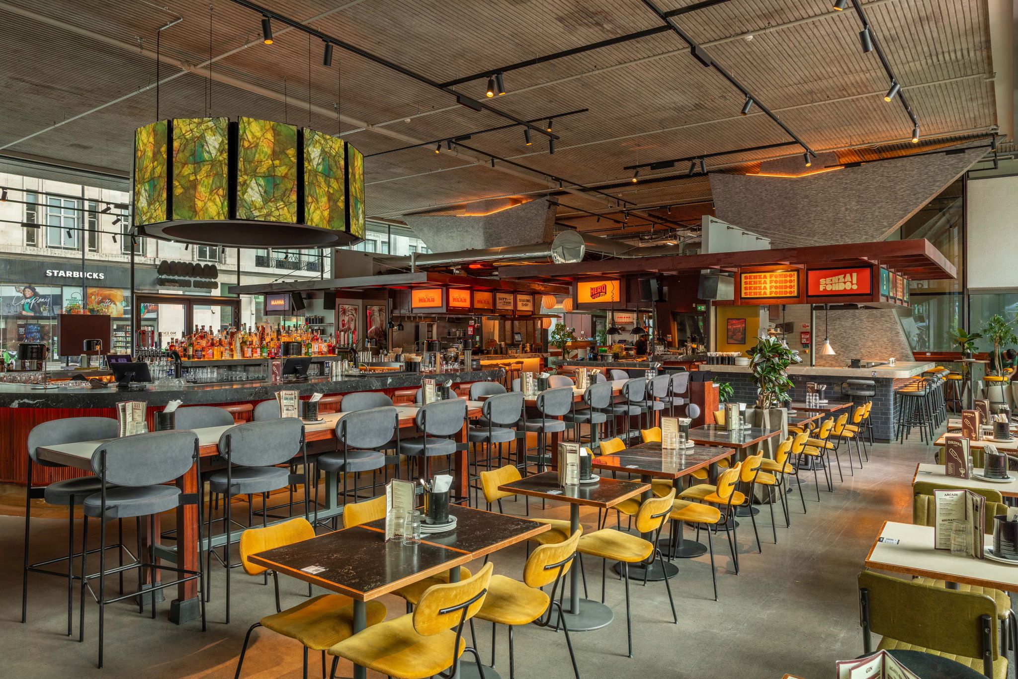 Modern restaurant interior in Arcade Tottenham Court Road, perfect for events and casual dining.