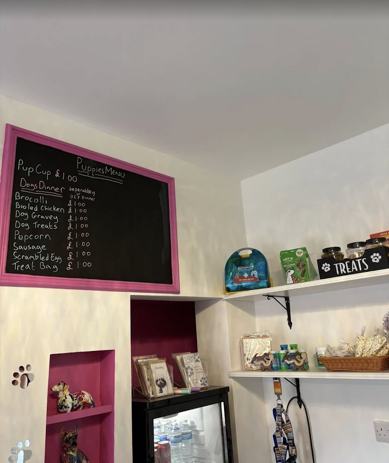 Playful pet-friendly menu at Canine Cuddle Cafe for dog lover events.