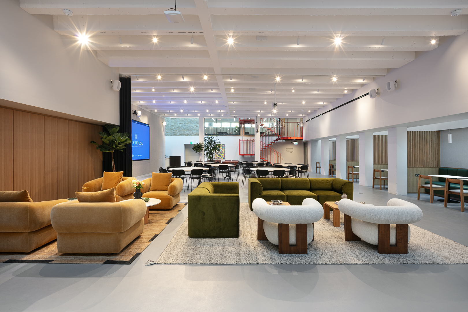 Modern event space at Hale House with lounge and banquet seating for conferences and networking.