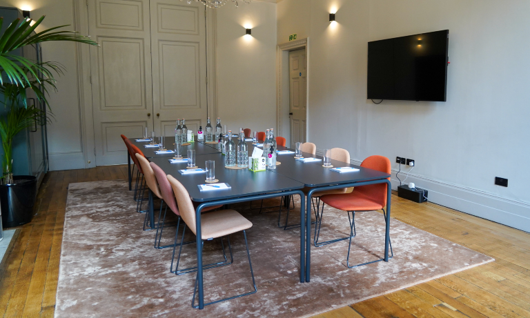 George Fleming at British Veterinary Association meeting room, ready for professional discussions.