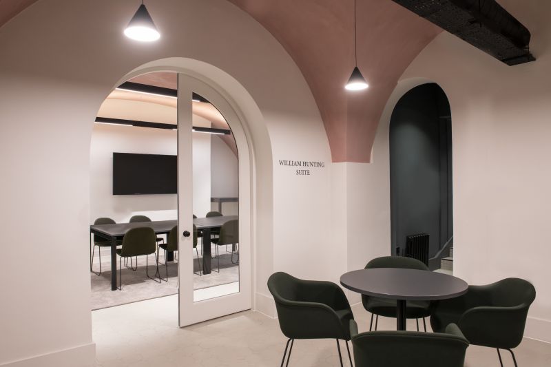 Modern William Hunting Suite, minimalist meeting room for professional gatherings and workshops.